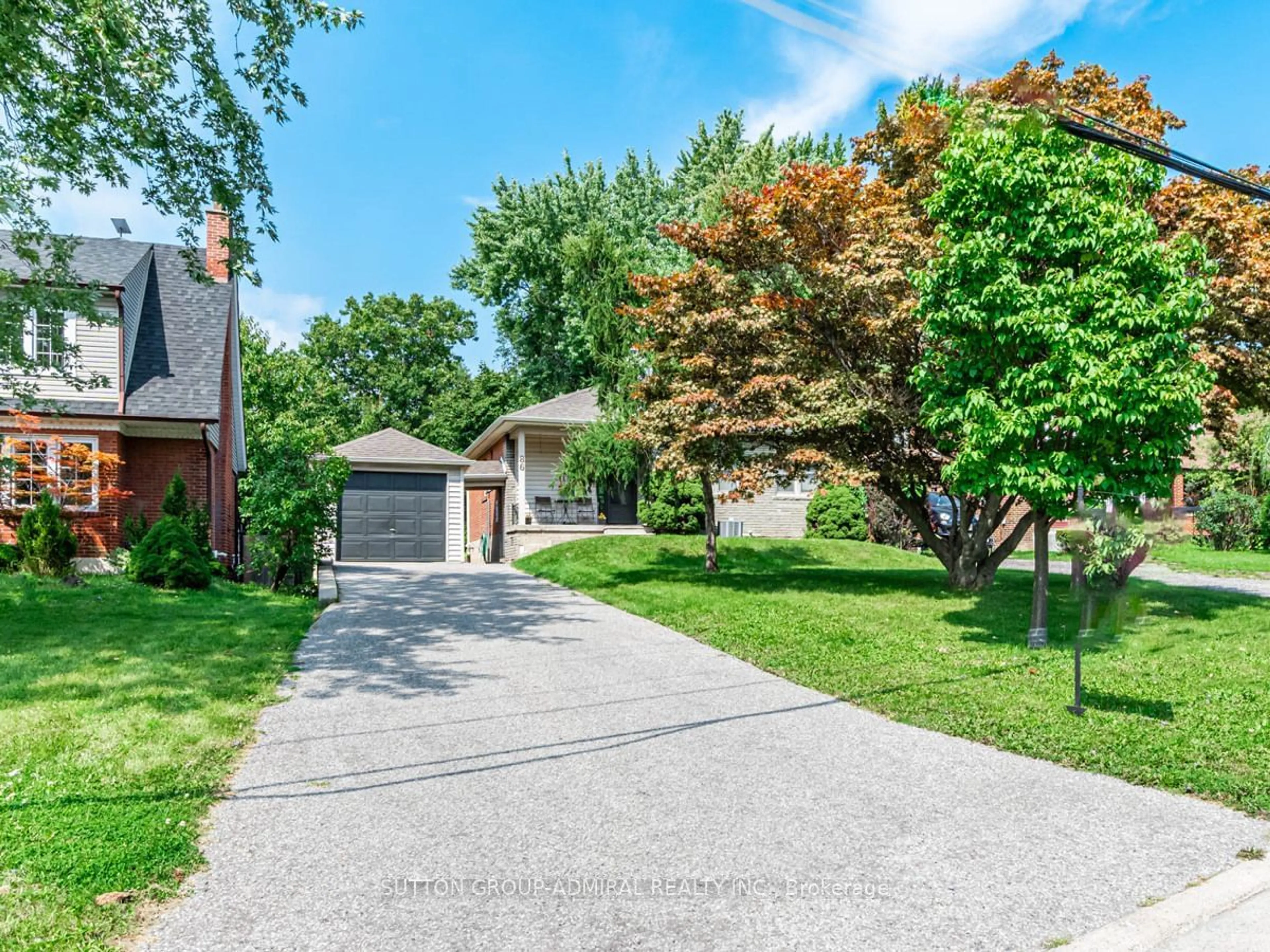 Frontside or backside of a home, the street view for 86 North Park Dr, Toronto Ontario M6L 1K2