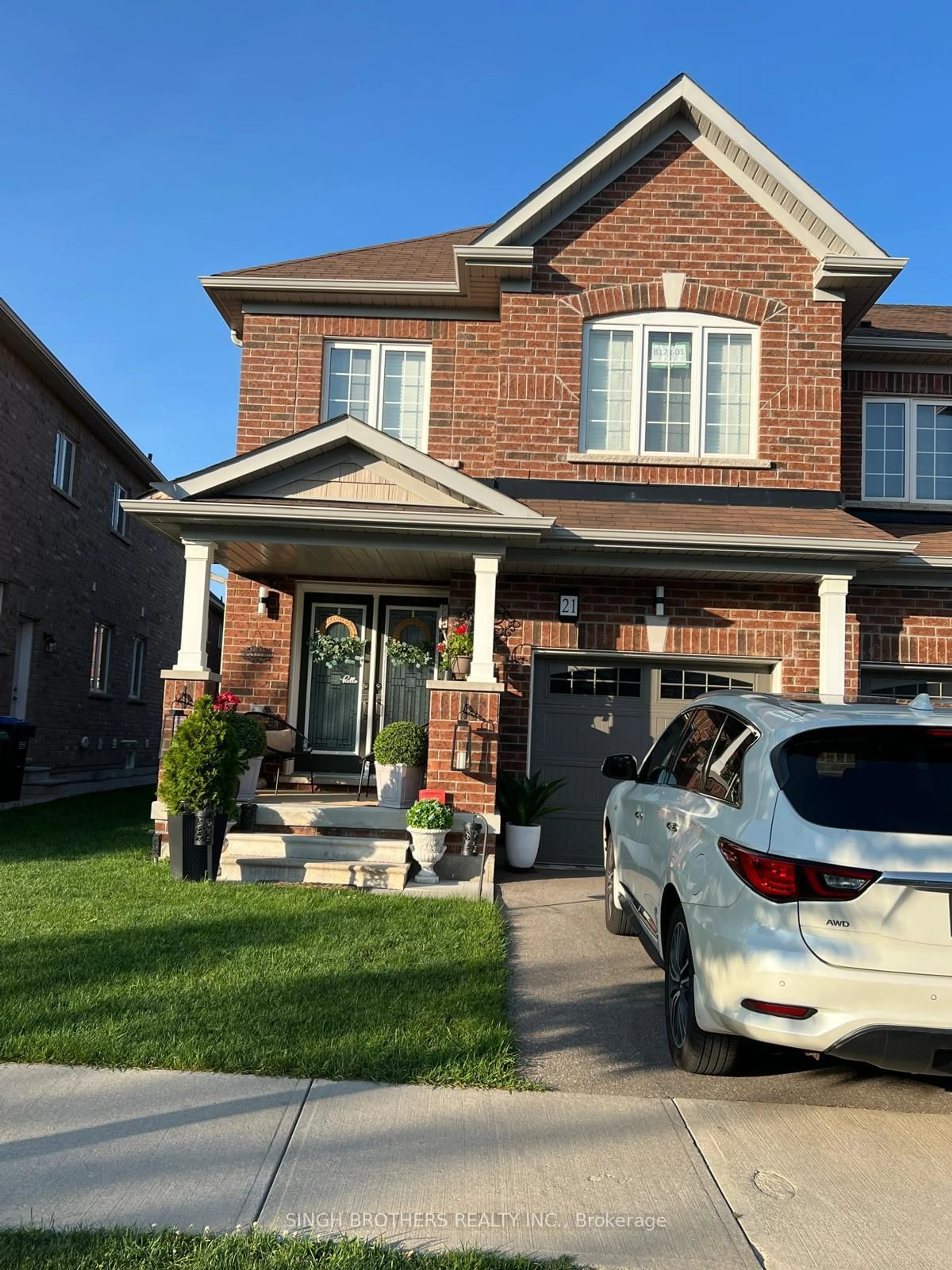 Home with brick exterior material for 21 Hoover Rd, Brampton Ontario L7A 4L2