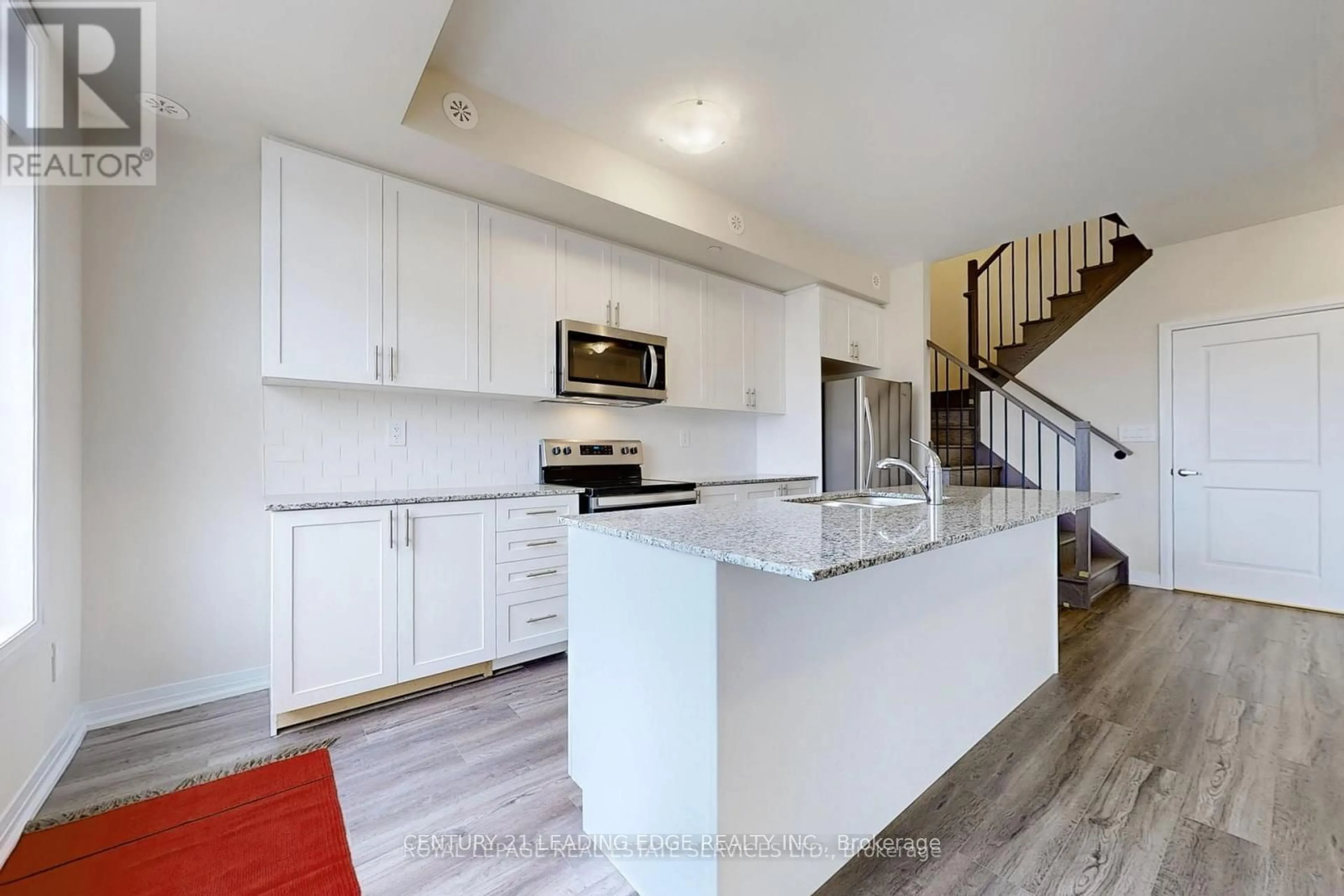 Open concept kitchen, unknown for 1565 Rose Way #116, Milton Ontario L9L 7E7