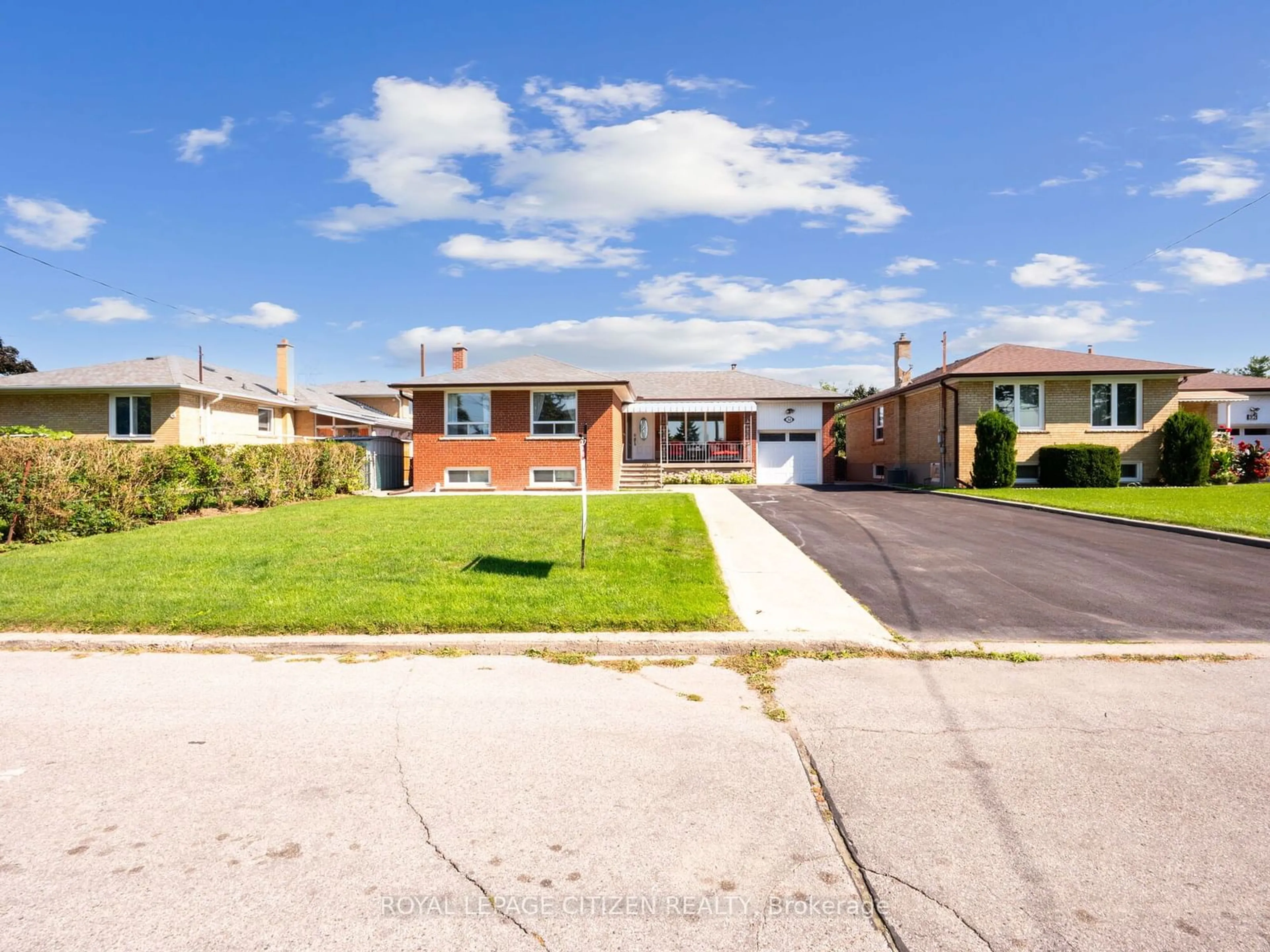 Frontside or backside of a home for 34 Belleglade Crt, Toronto Ontario M9M 2W4