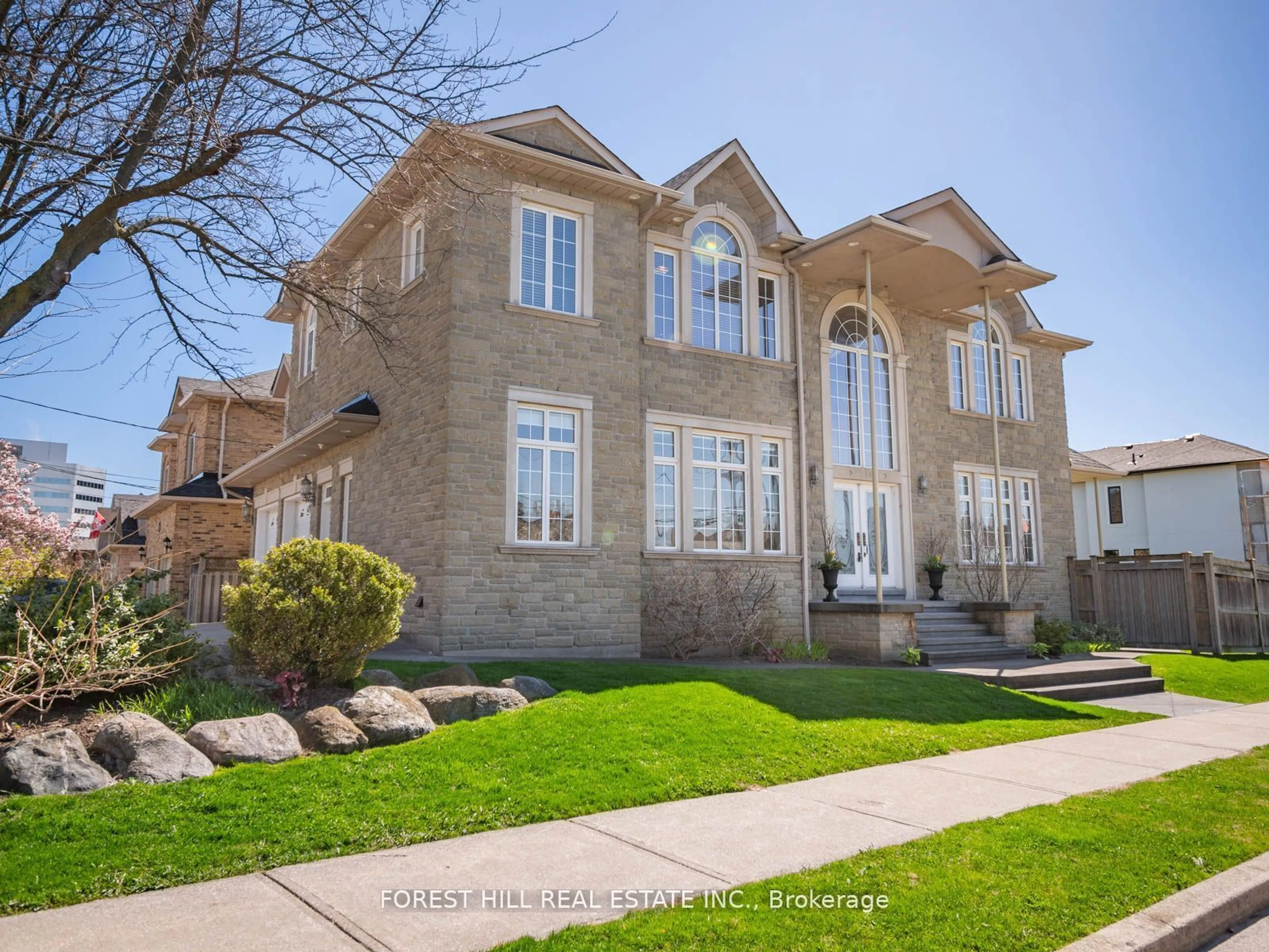 Frontside or backside of a home, the street view for 18 Highland Hill, Toronto Ontario M6A 2P8