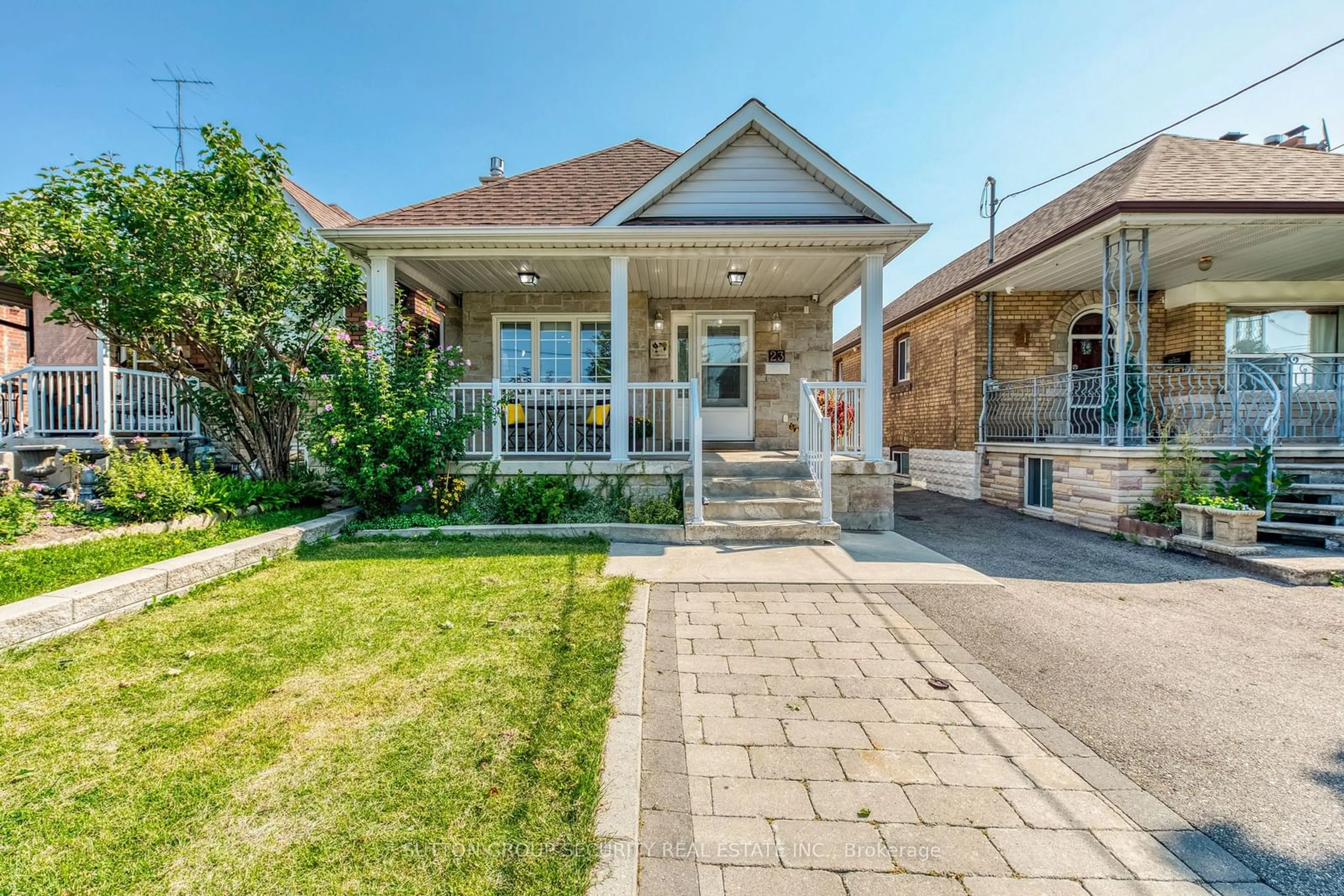 Frontside or backside of a home, cottage for 23 Hartley Ave, Toronto Ontario M6E 4E7