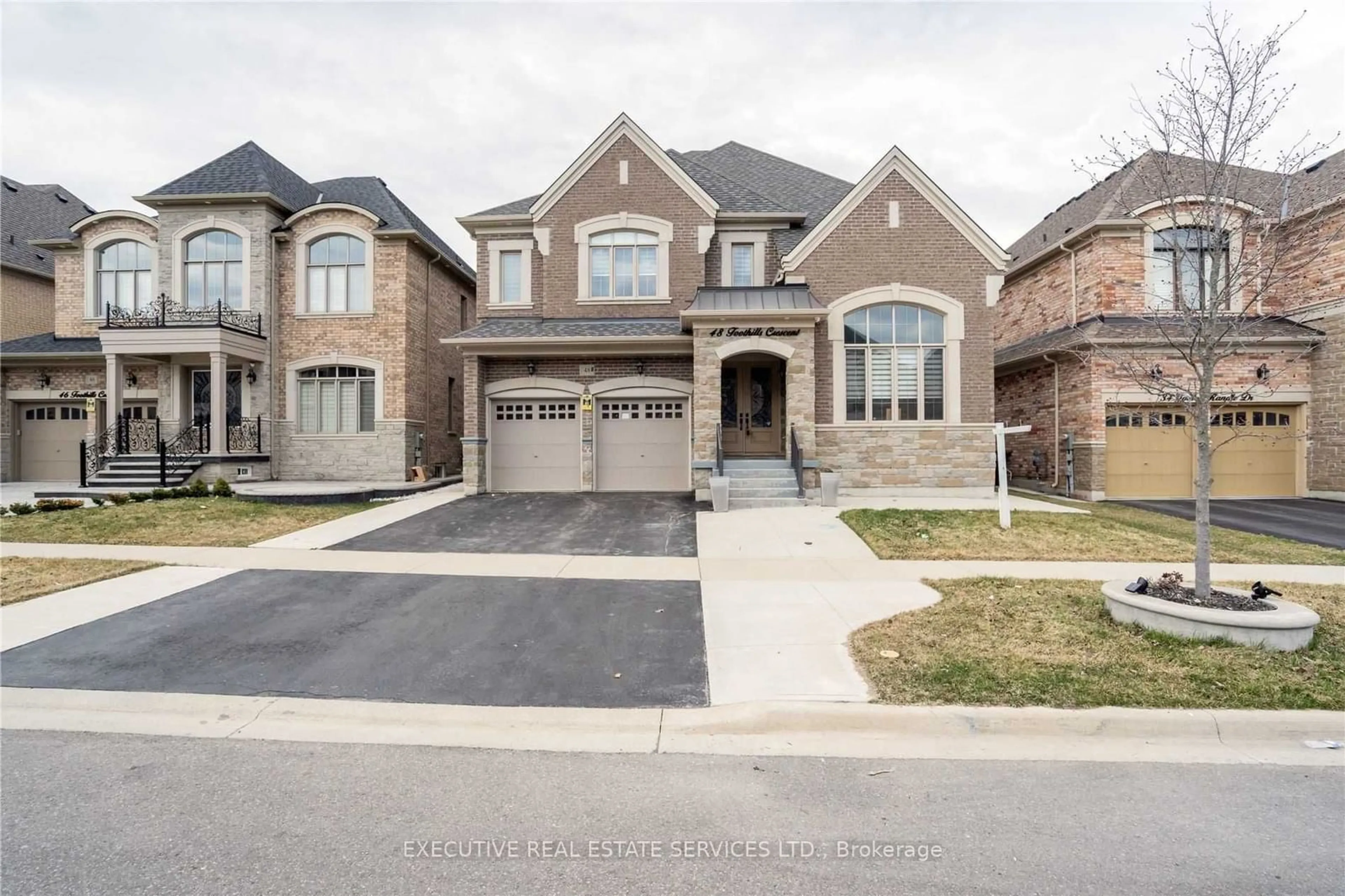 Home with brick exterior material for 48 Foothills Cres, Brampton Ontario L6P 4G9