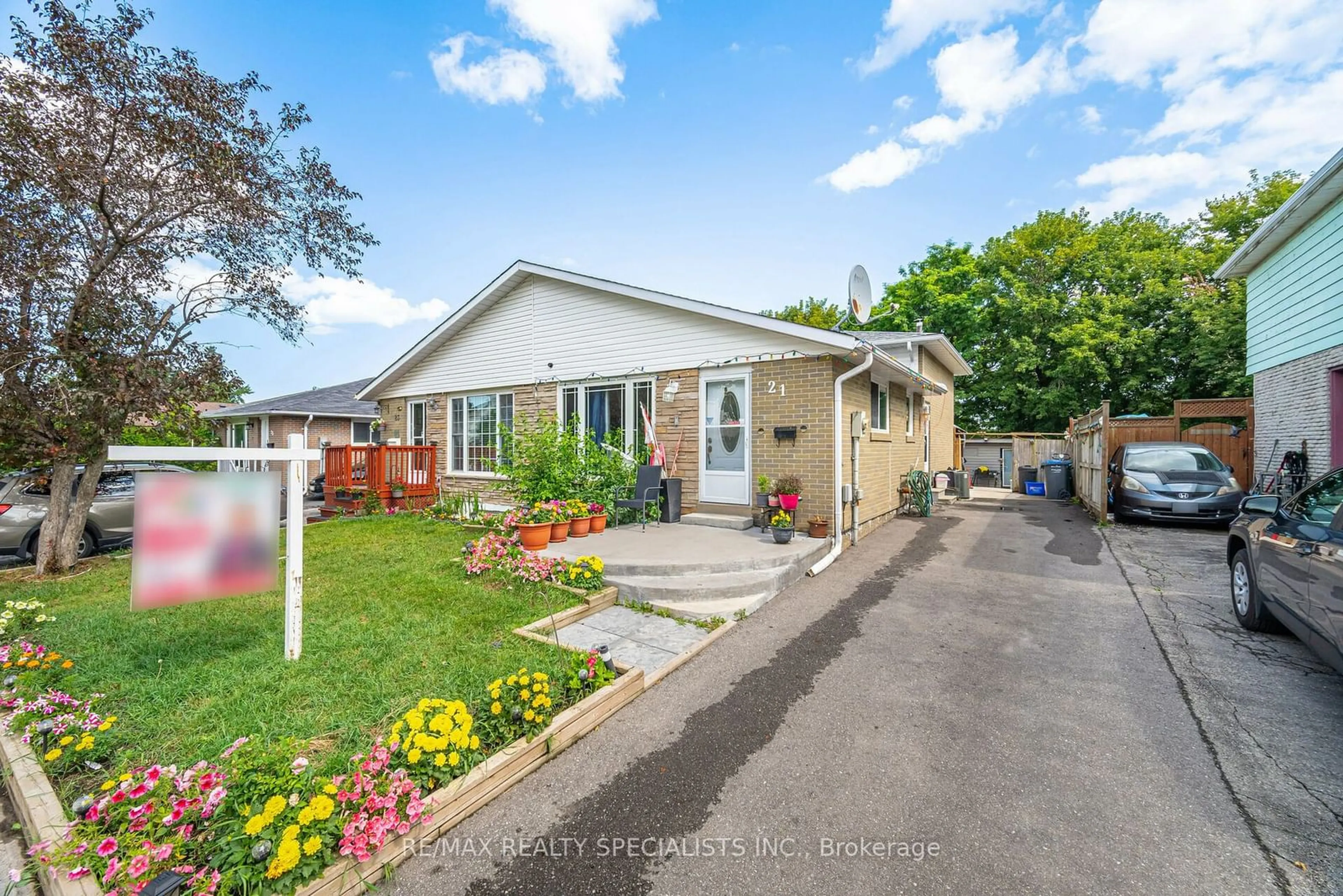 Frontside or backside of a home, the fenced backyard for 21 Crawford Dr, Brampton Ontario L6V 2C6