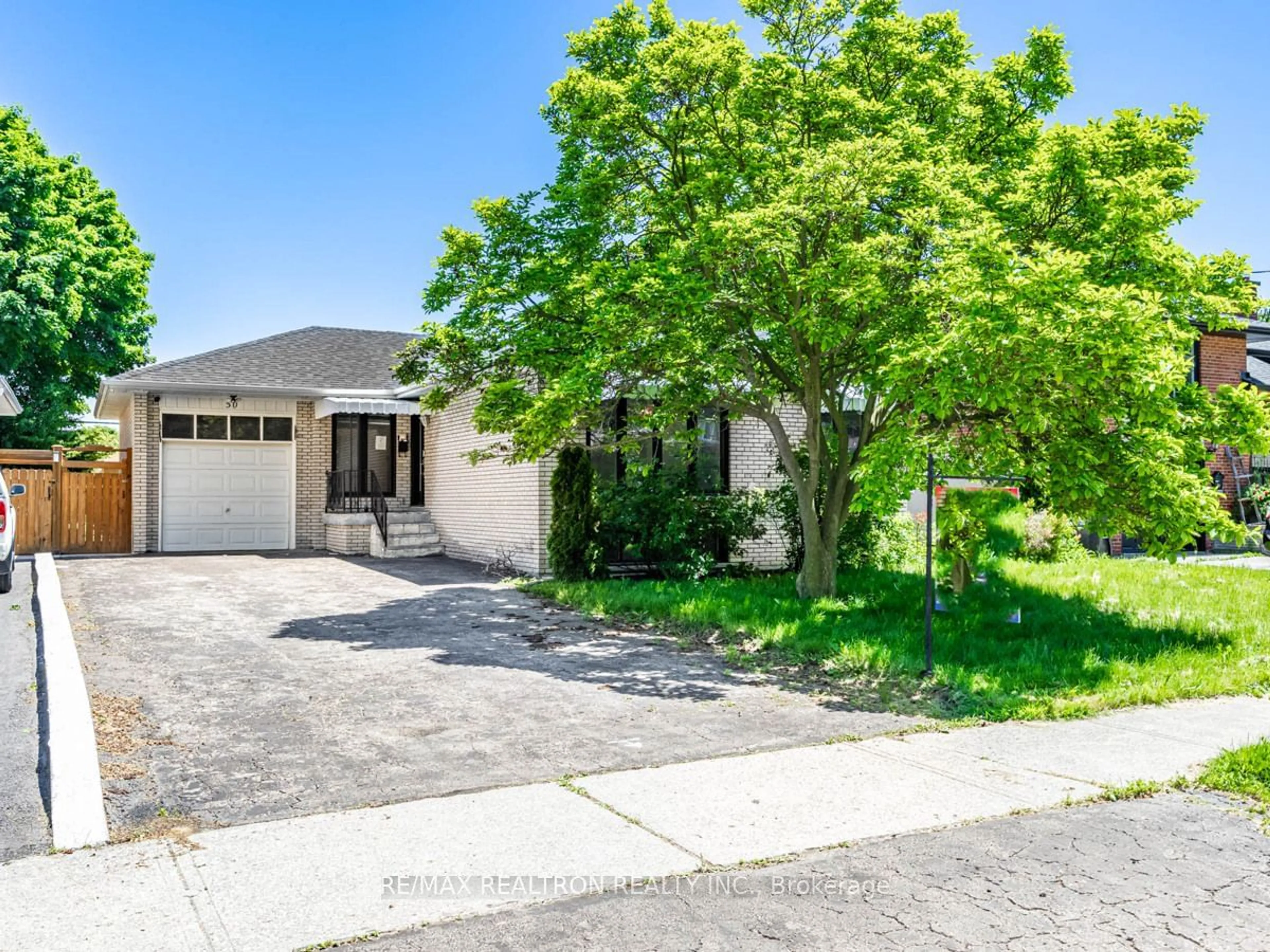 Frontside or backside of a home, the street view for 50 Breadner Dr, Toronto Ontario M9R 3M4