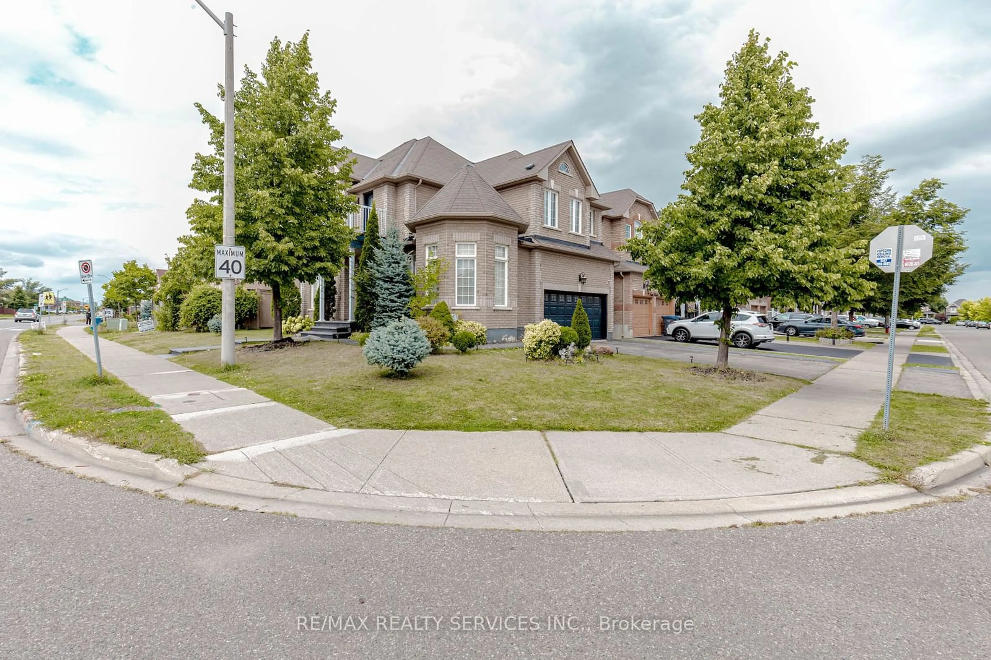 Frontside or backside of a home, the street view for 475 Van Kirk Dr, Brampton Ontario L7A 0J2