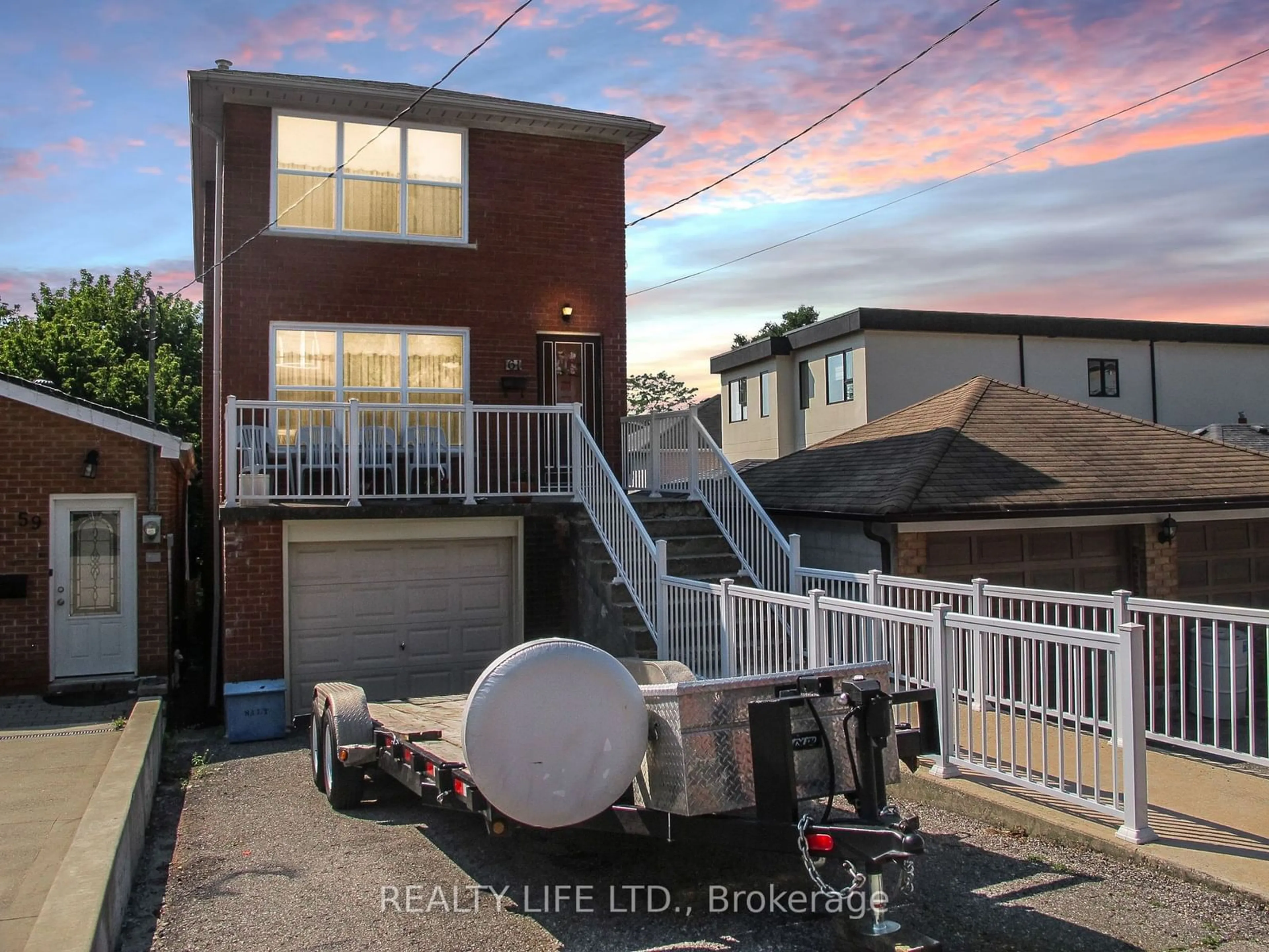 Frontside or backside of a home, the street view for 61 Cameron Ave, Toronto Ontario M6M 1R1