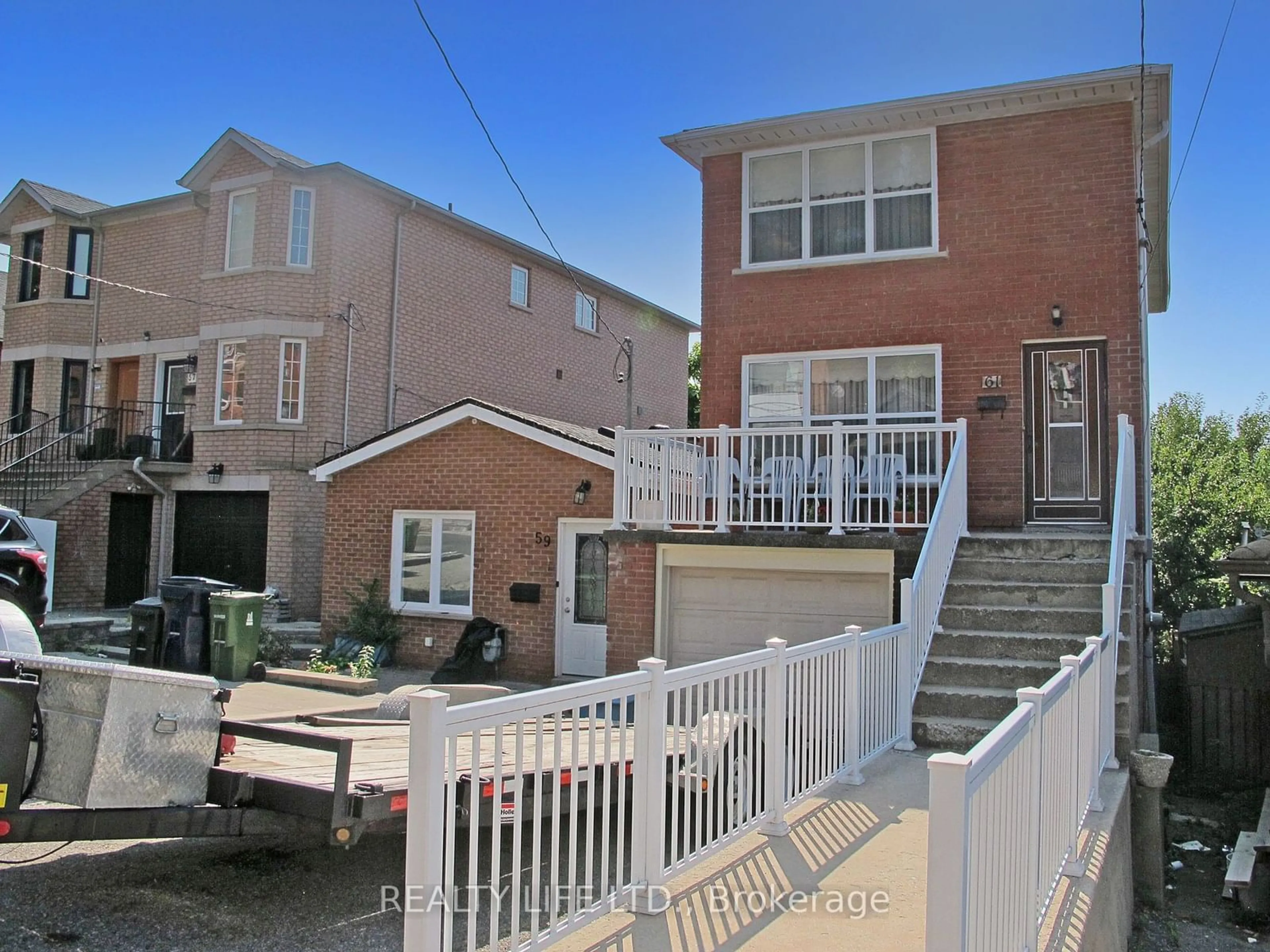 A pic from exterior of the house or condo, the street view for 61 Cameron Ave, Toronto Ontario M6M 1R1