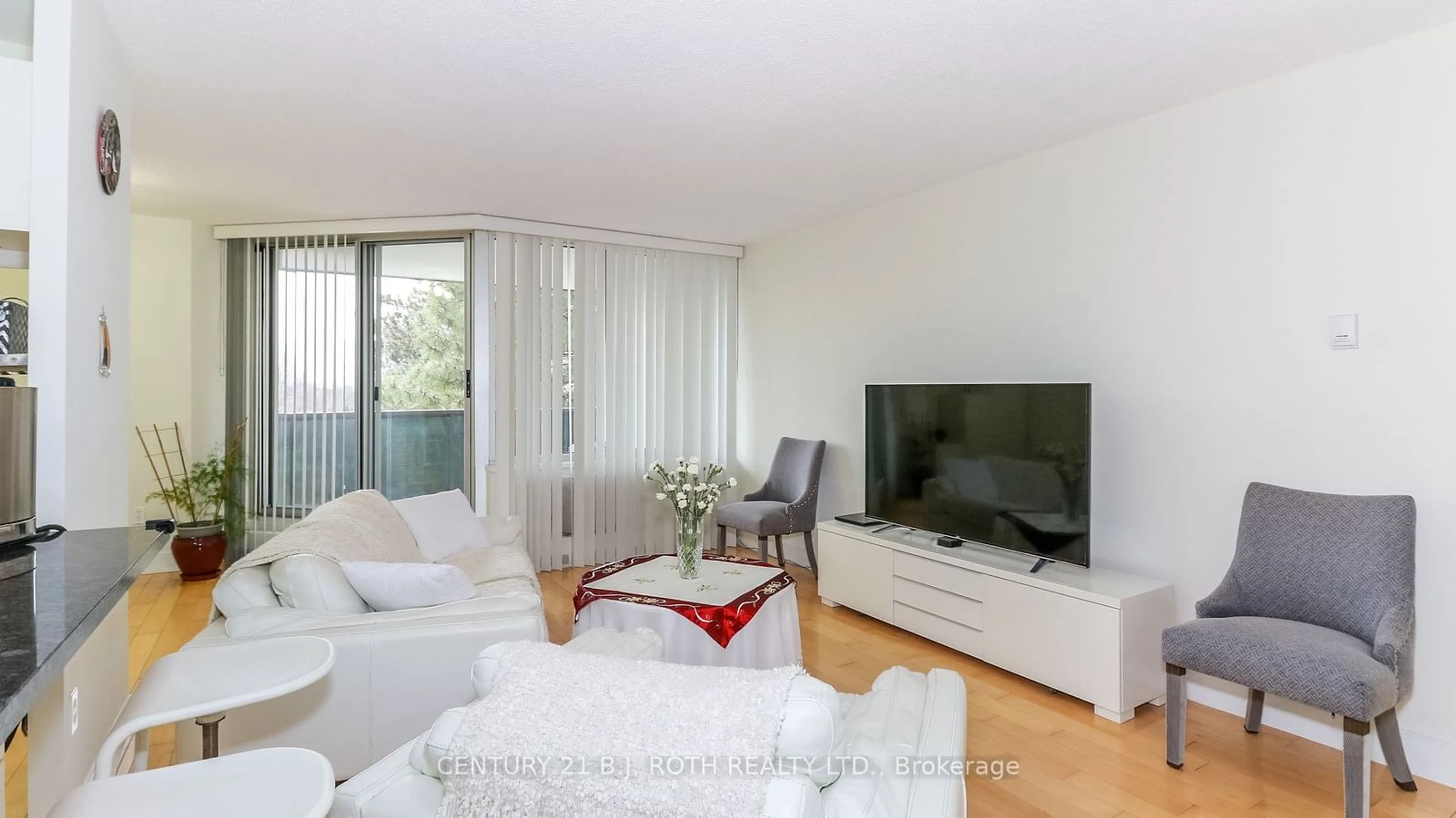 Living room, wood floors for 420 Mill Rd #412, Toronto Ontario M9C 1Z1