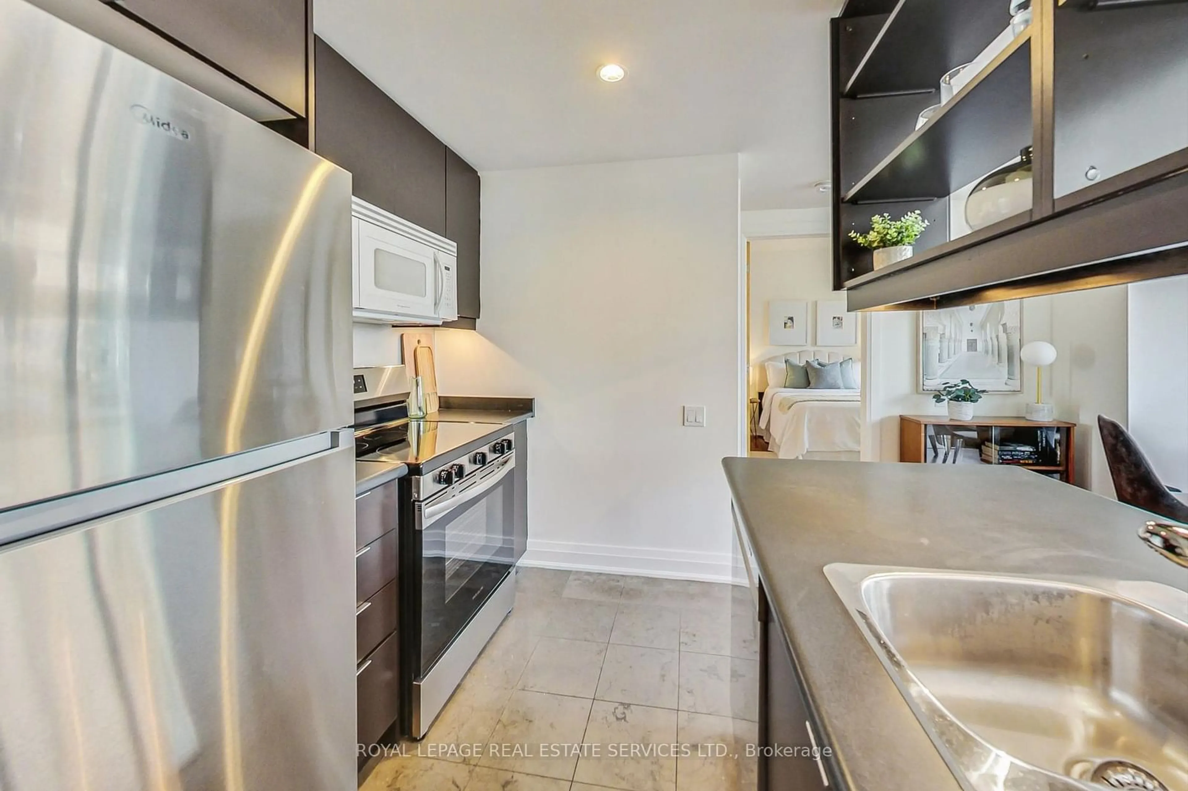 Standard kitchen, wood floors for 383 Ellis Park Rd #705, Toronto Ontario M6S 5B2