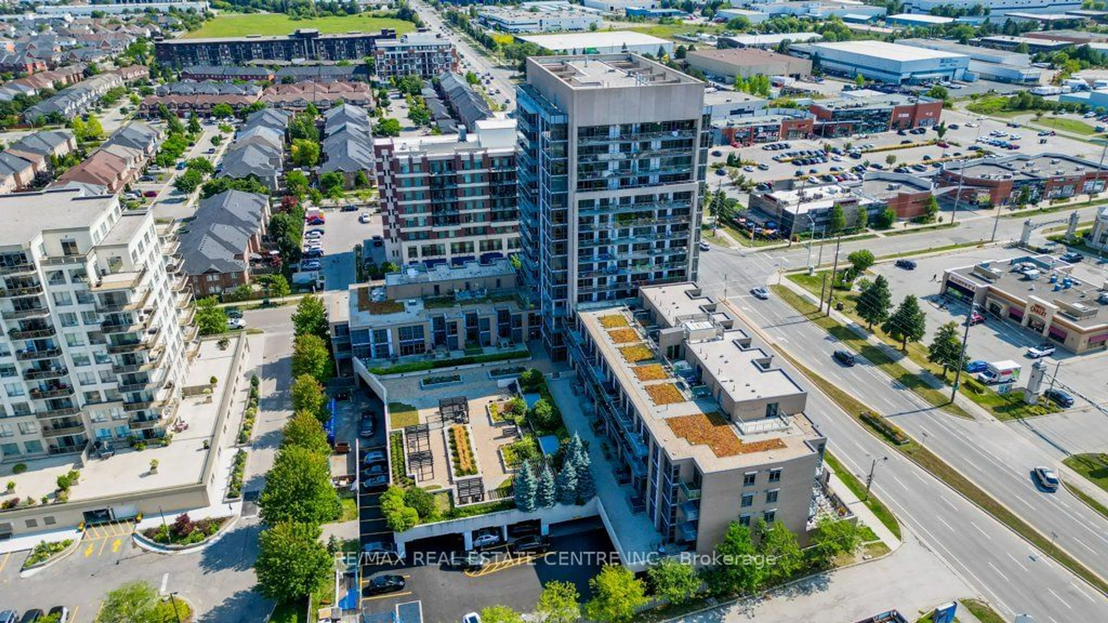 A pic from exterior of the house or condo, the view of city buildings for 1940 Ironstone Dr #304, Burlington Ontario L7L 0E4