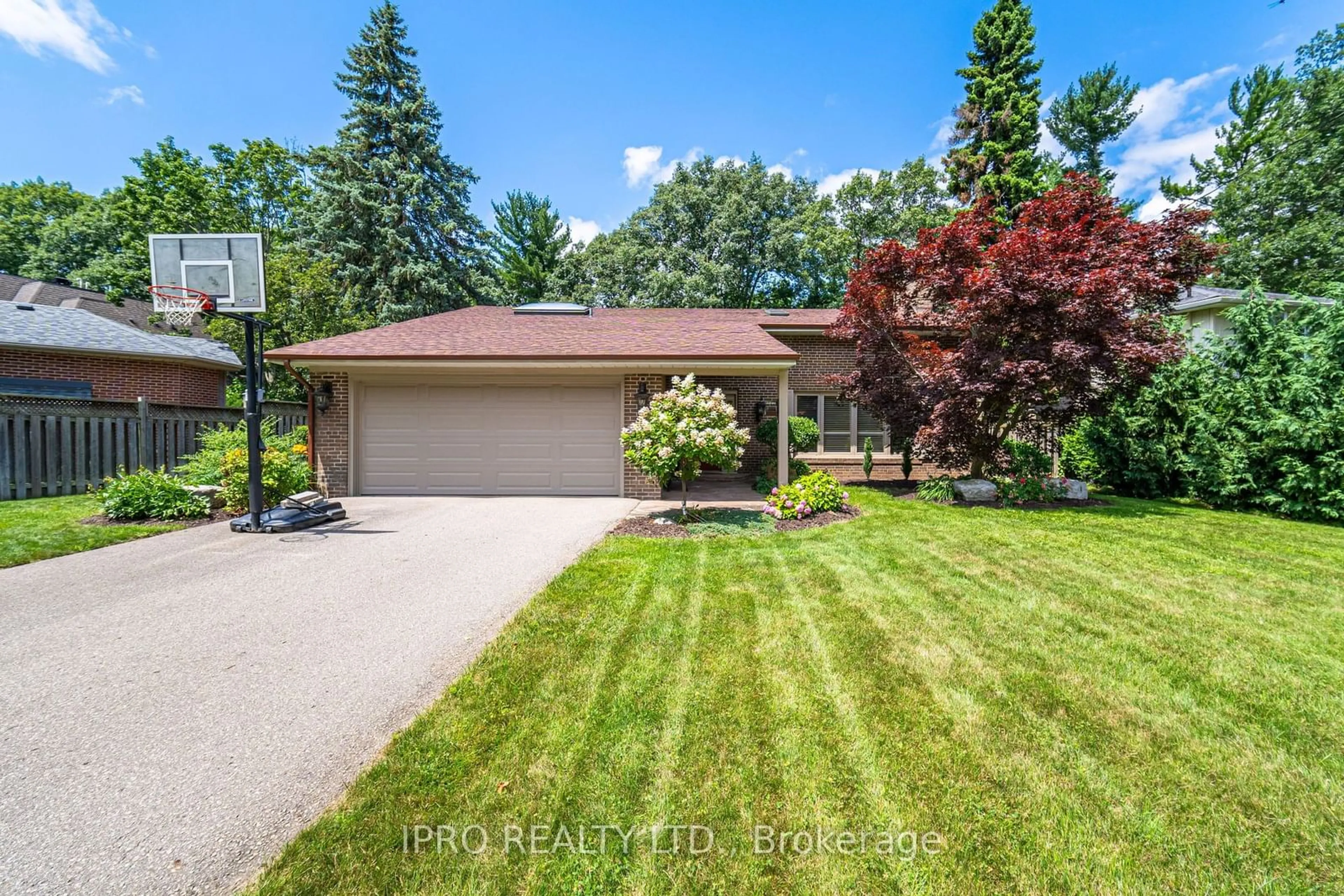 Frontside or backside of a home, the fenced backyard for 1117 Springhill Dr, Mississauga Ontario L5H 1N2