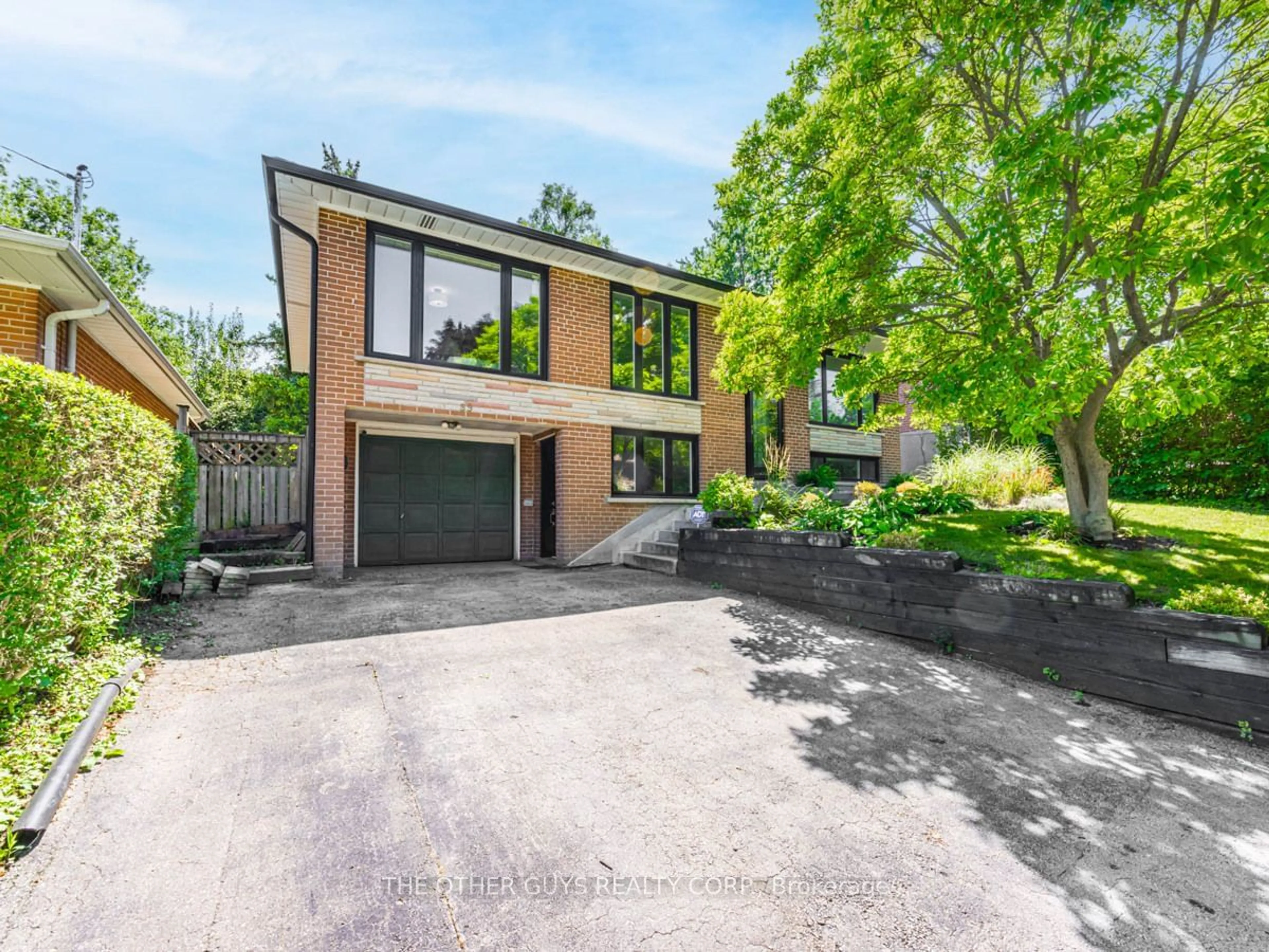 Home with brick exterior material for 89 Alhart Dr, Toronto Ontario M9V 2N6