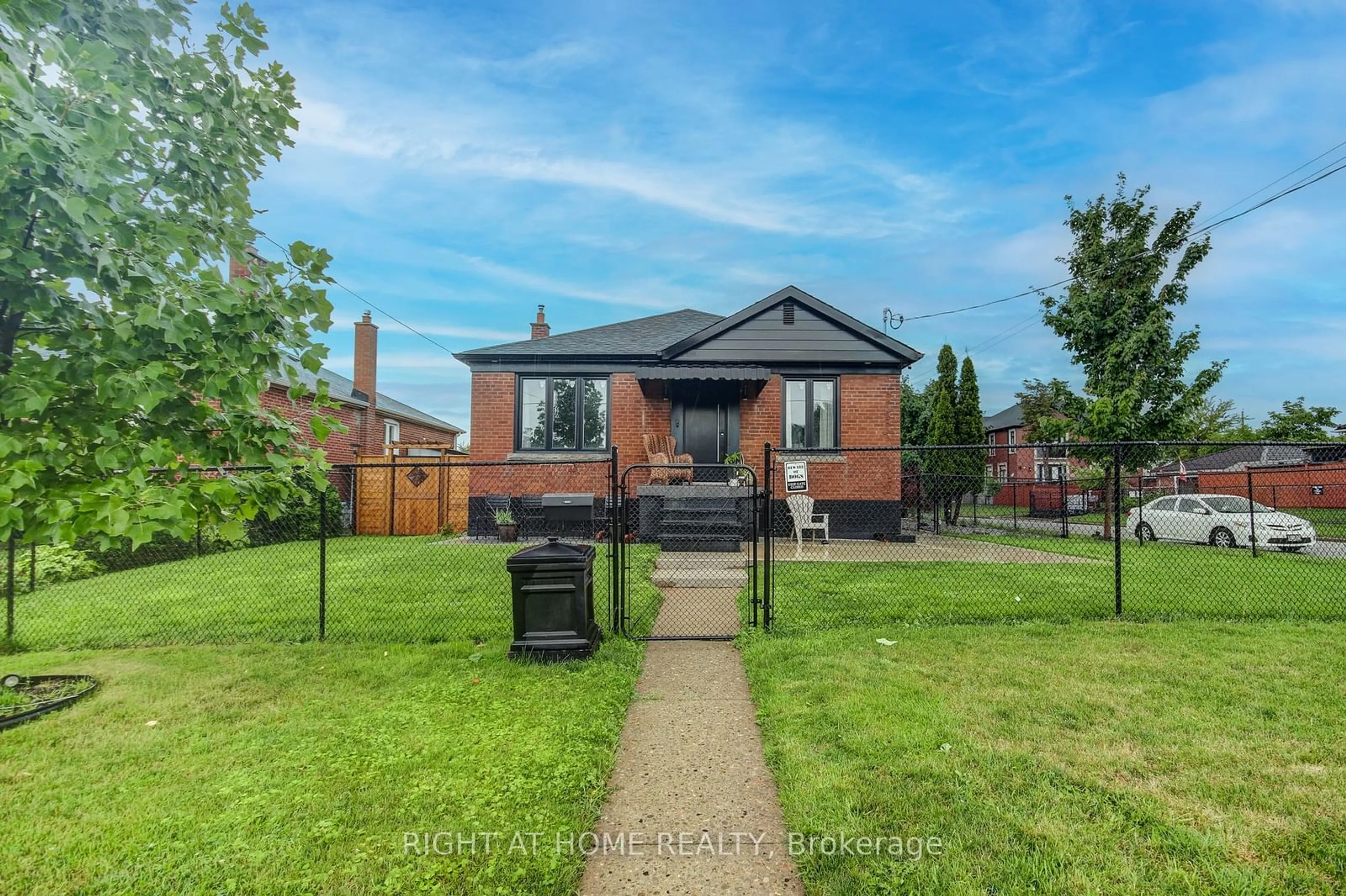 Frontside or backside of a home for 42 Bunnell Cres, Toronto Ontario M3M 2C1