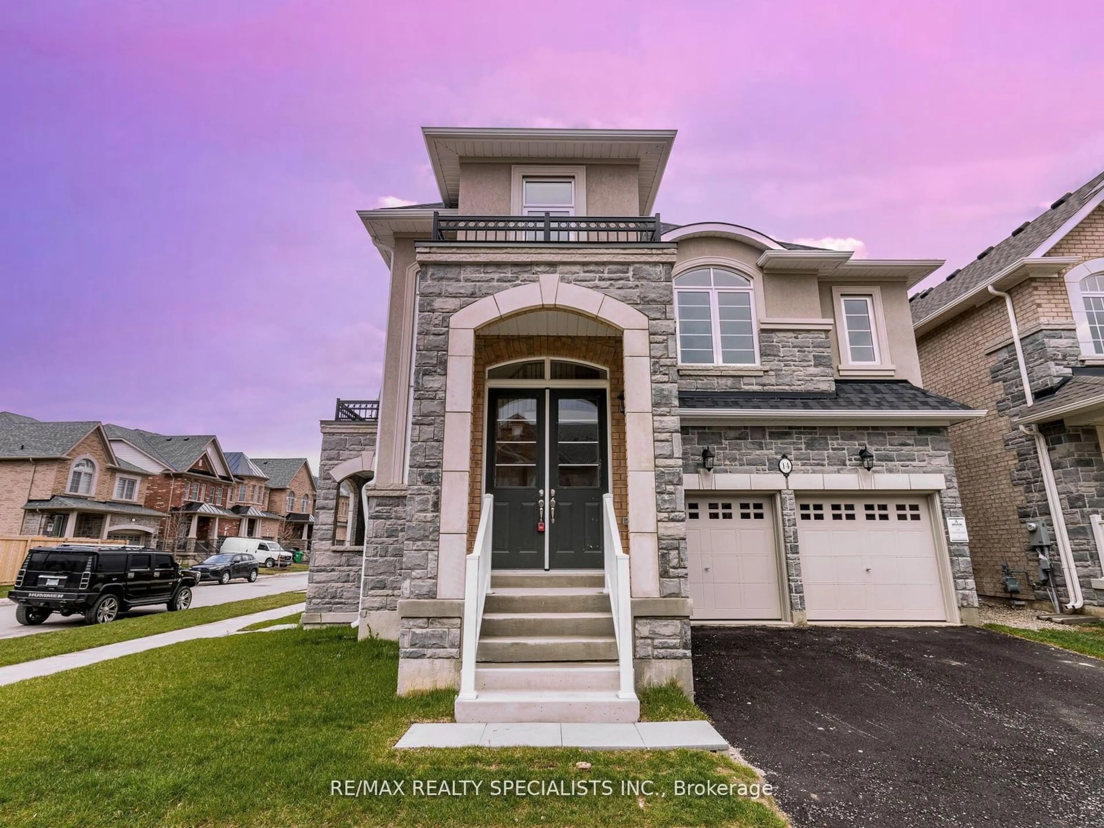 Frontside or backside of a home for 14 Donald Stewart Rd, Brampton Ontario L7A 5J8