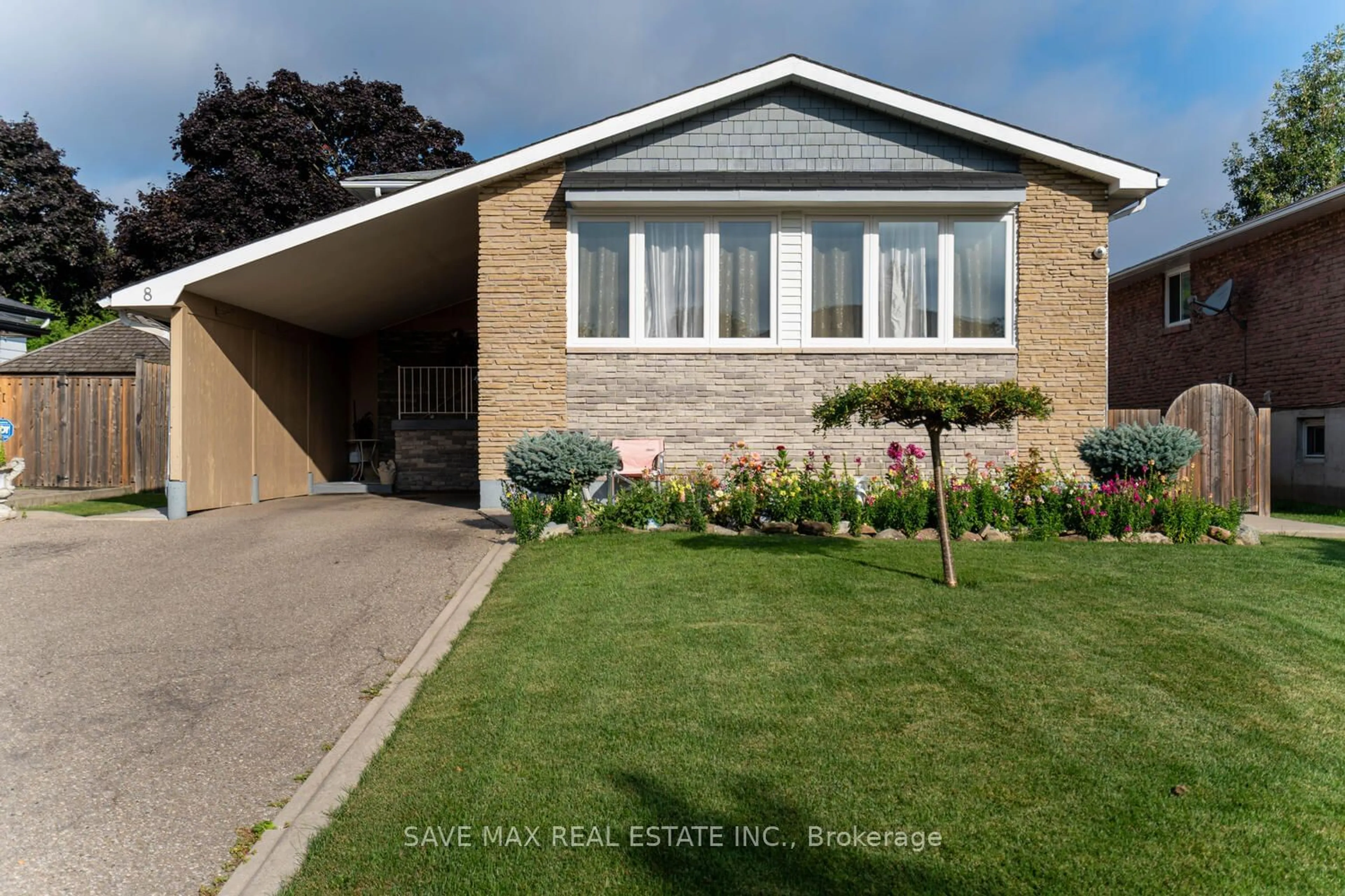 Frontside or backside of a home, the street view for 8 Edwin Dr, Brampton Ontario L6Y 1A1