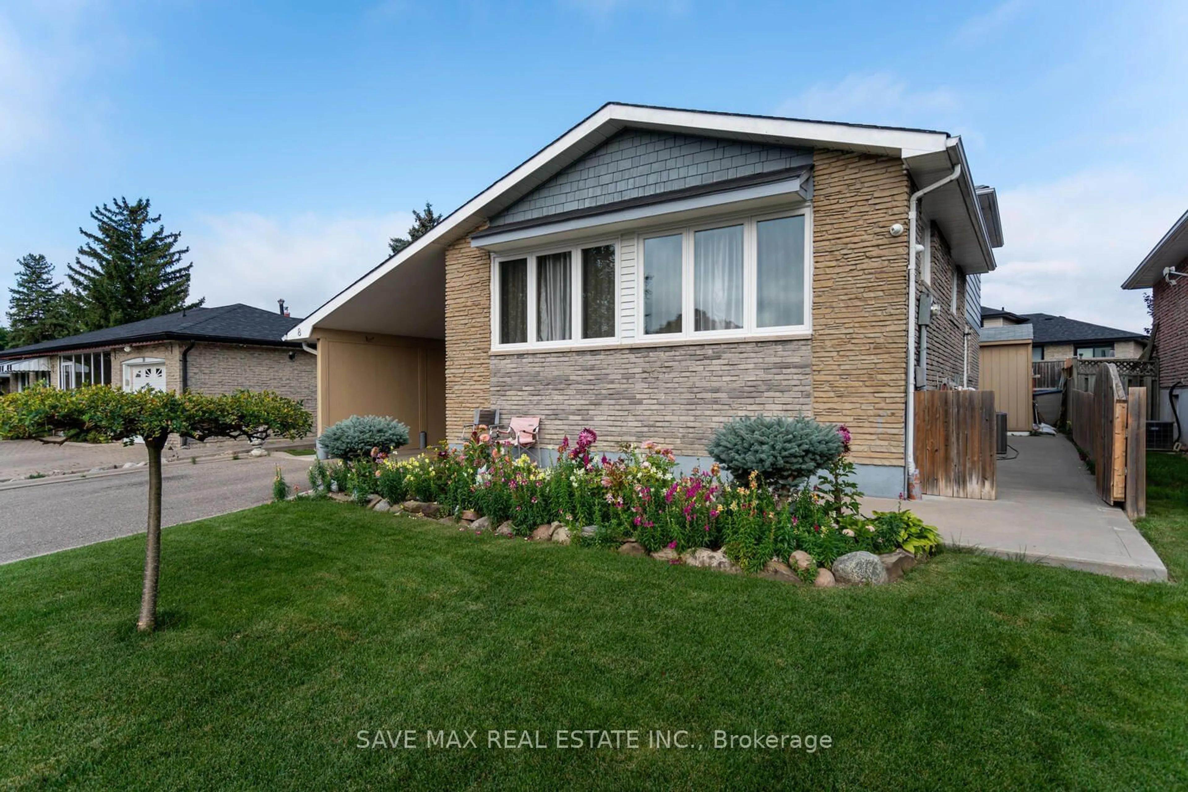 Frontside or backside of a home, the fenced backyard for 8 Edwin Dr, Brampton Ontario L6Y 1A1