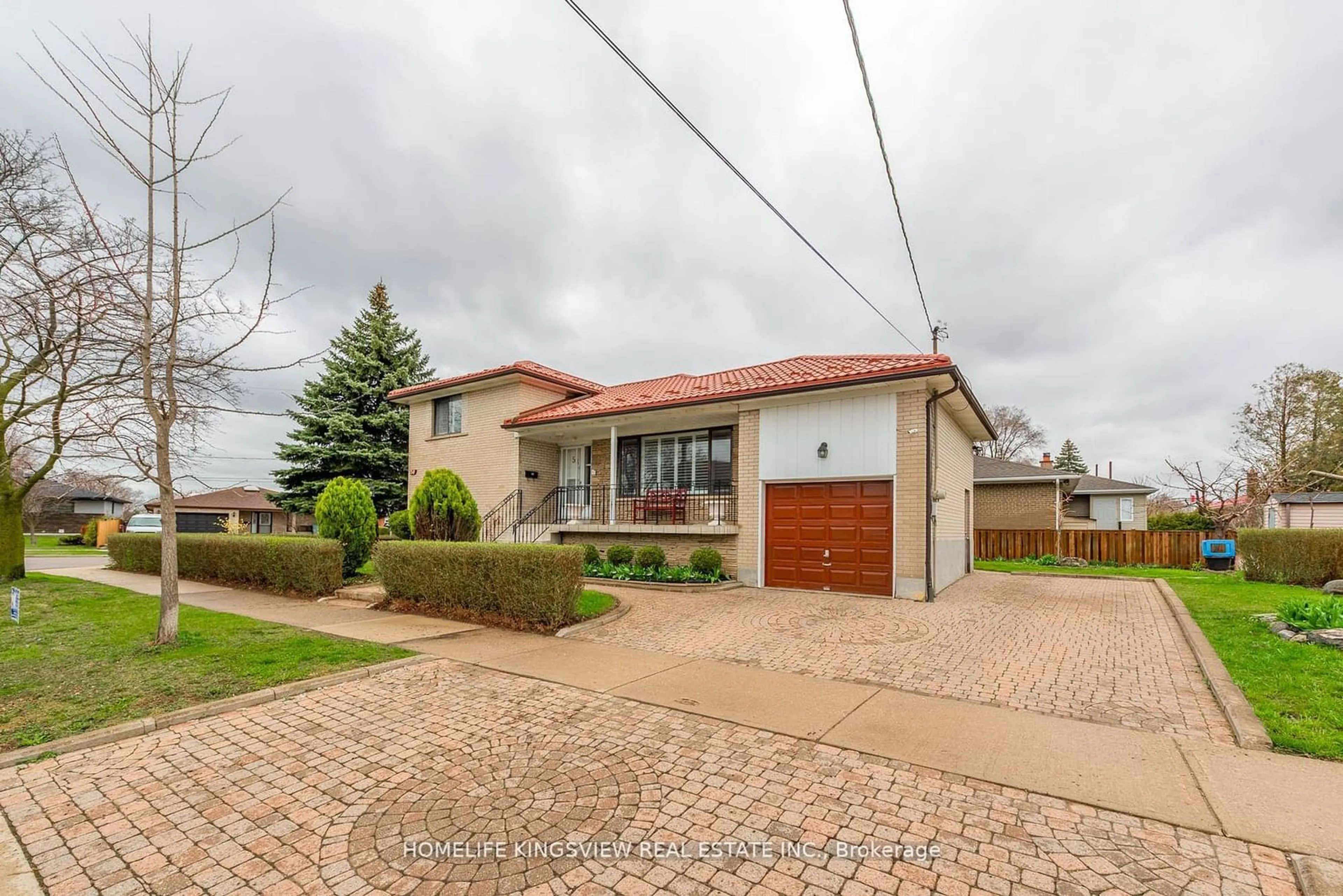 Frontside or backside of a home, the street view for 58 Storer Dr, Toronto Ontario M9M 1X7