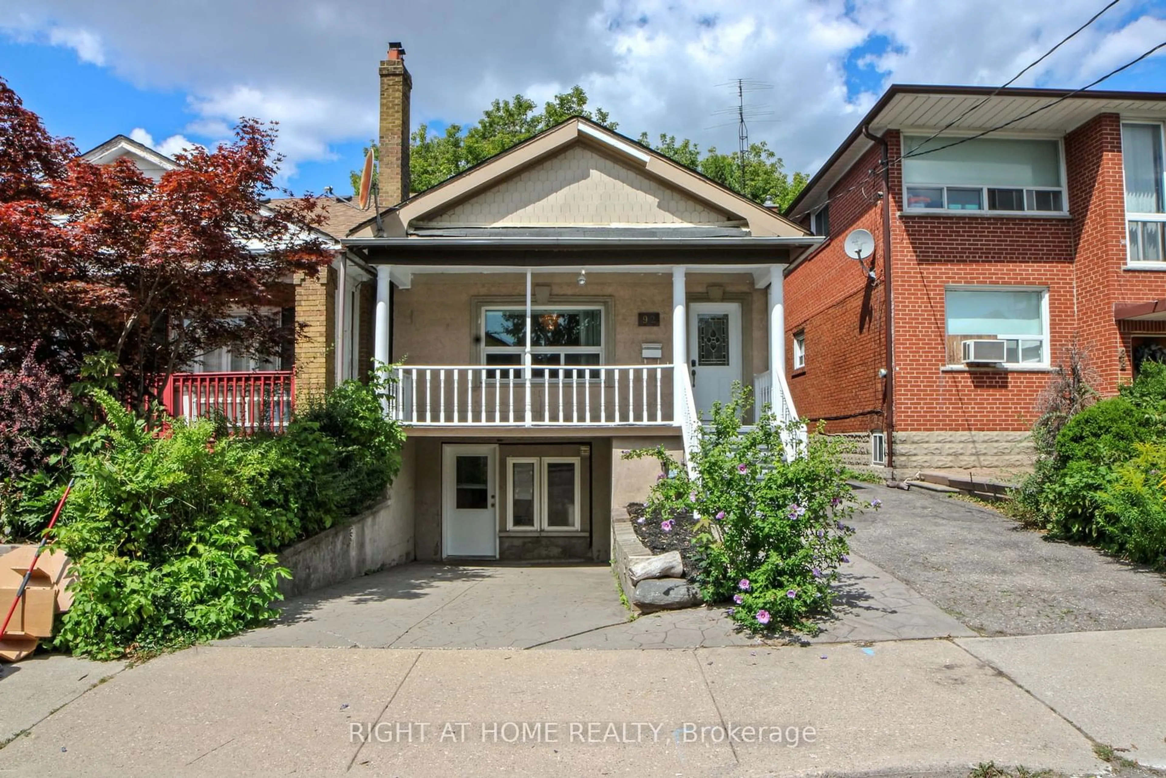 Frontside or backside of a home for 92 Livingstone Ave, Toronto Ontario M6E 2L8