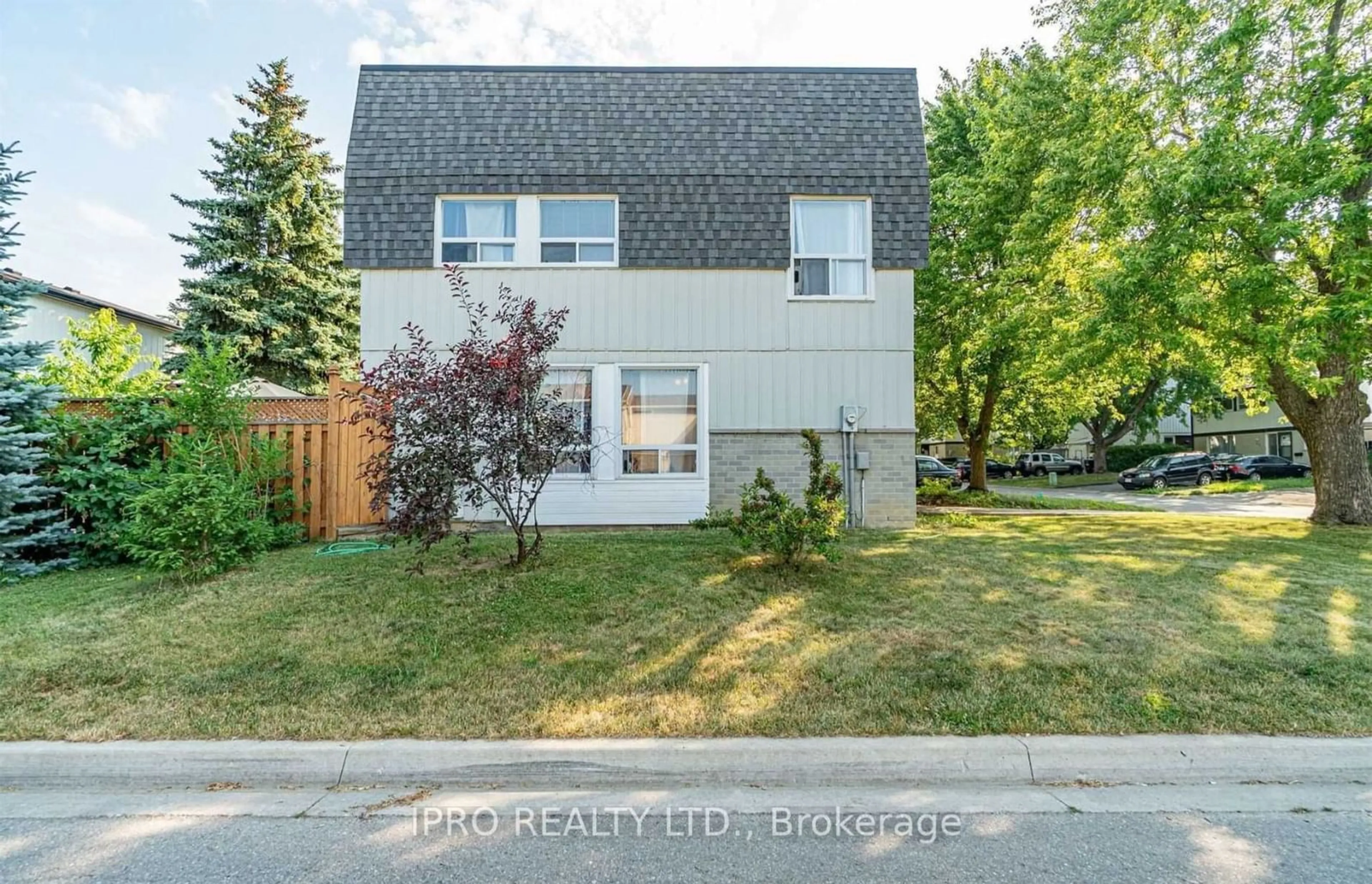 A pic from exterior of the house or condo, the fenced backyard for 1 Garrison Sq, Brampton Ontario L6S 2H3