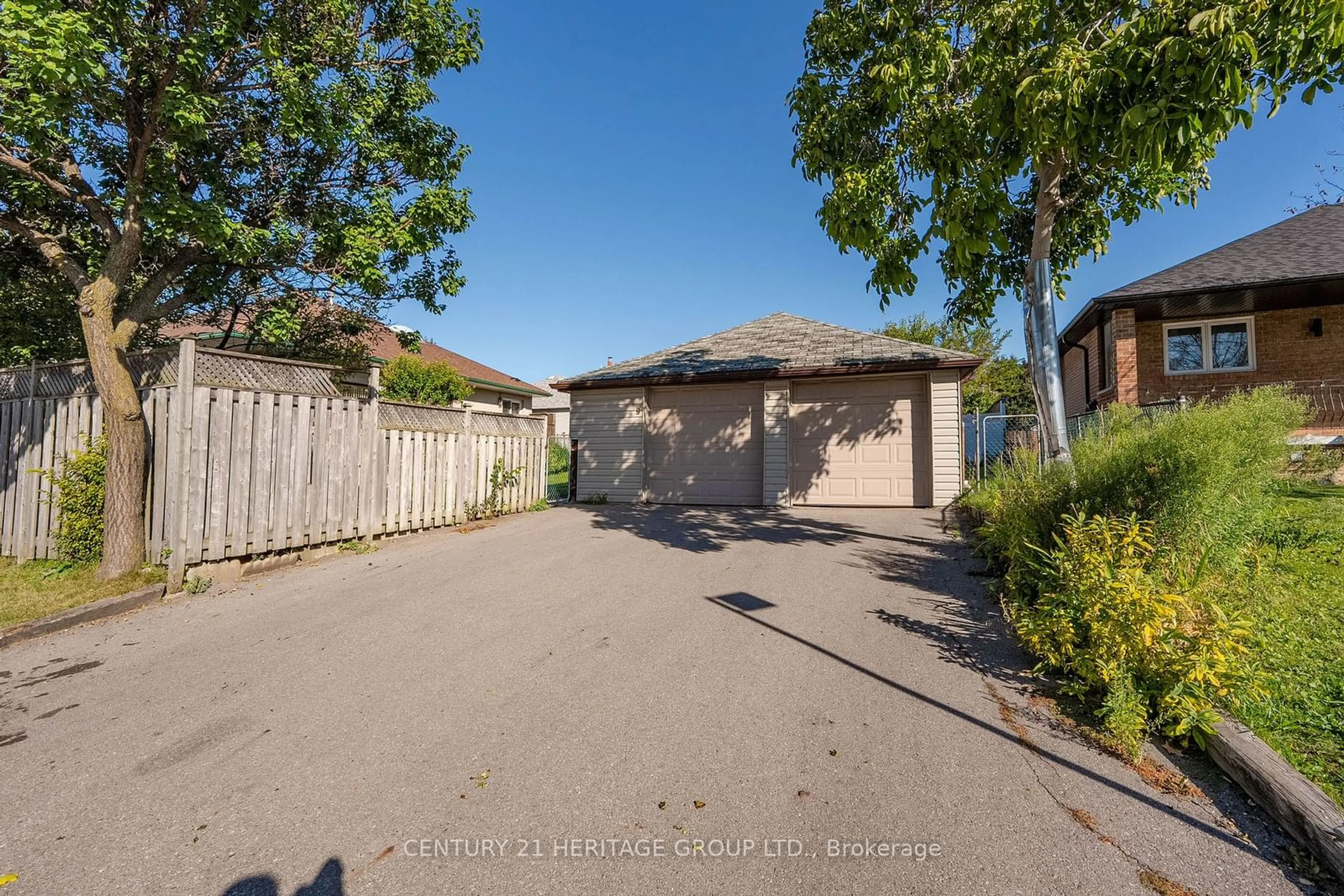 Frontside or backside of a home, the fenced backyard for 9 Cuffley Cres, Toronto Ontario M3K 1X5