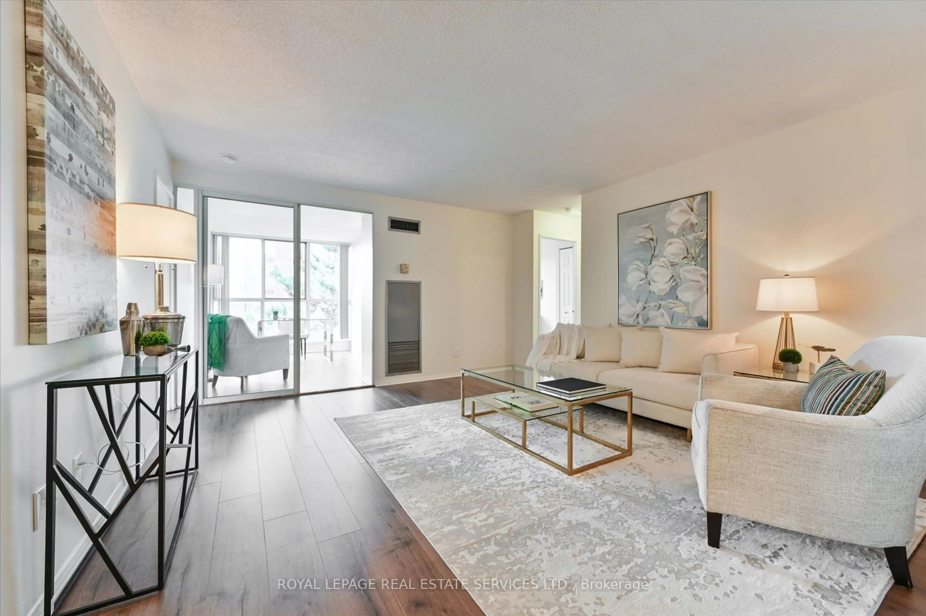 Living room, wood floors for 20 Southport St #418, Toronto Ontario M6S 4Y8