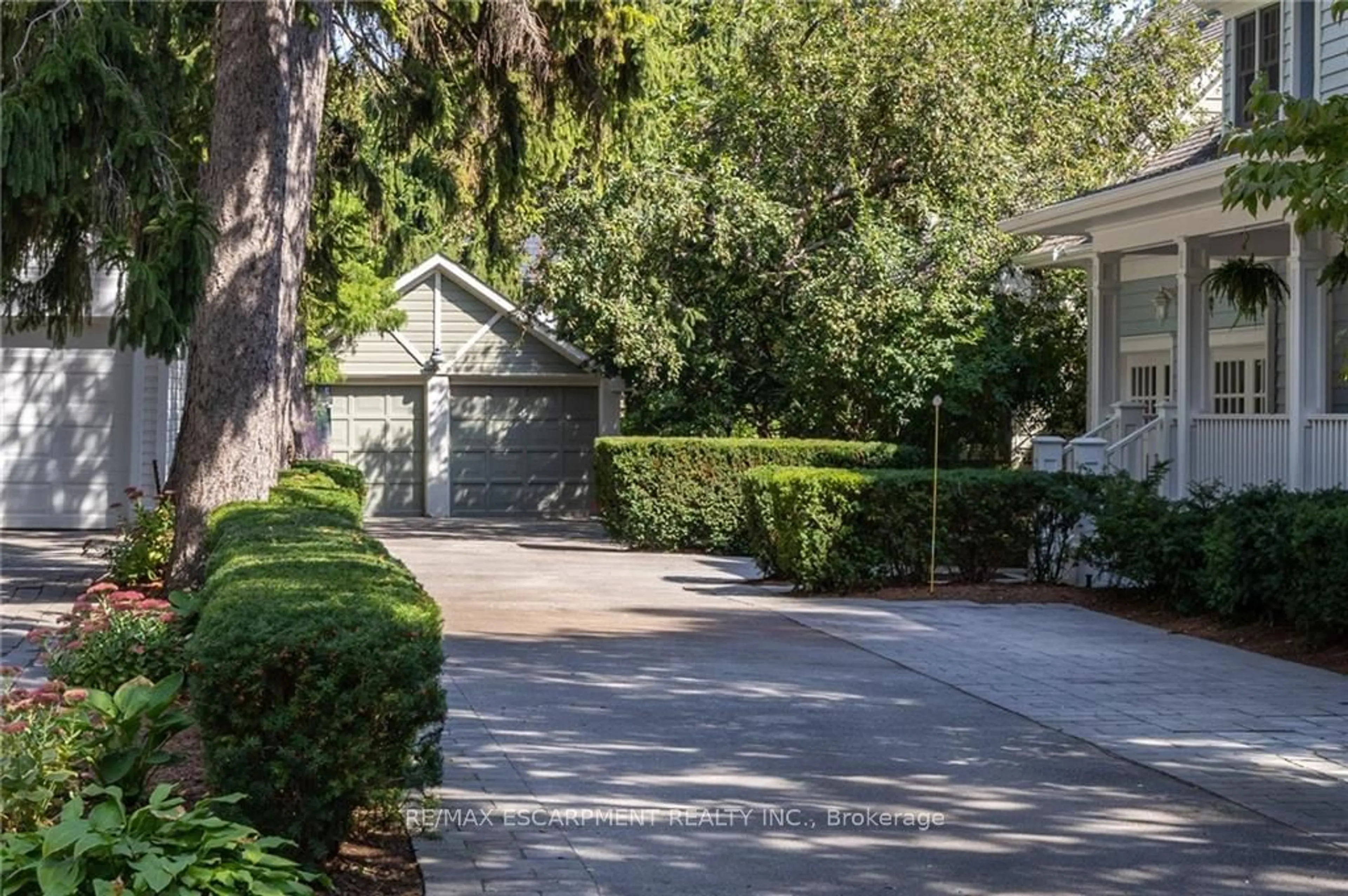 Frontside or backside of a home, the street view for 21 Second St, Oakville Ontario L6J 3T1