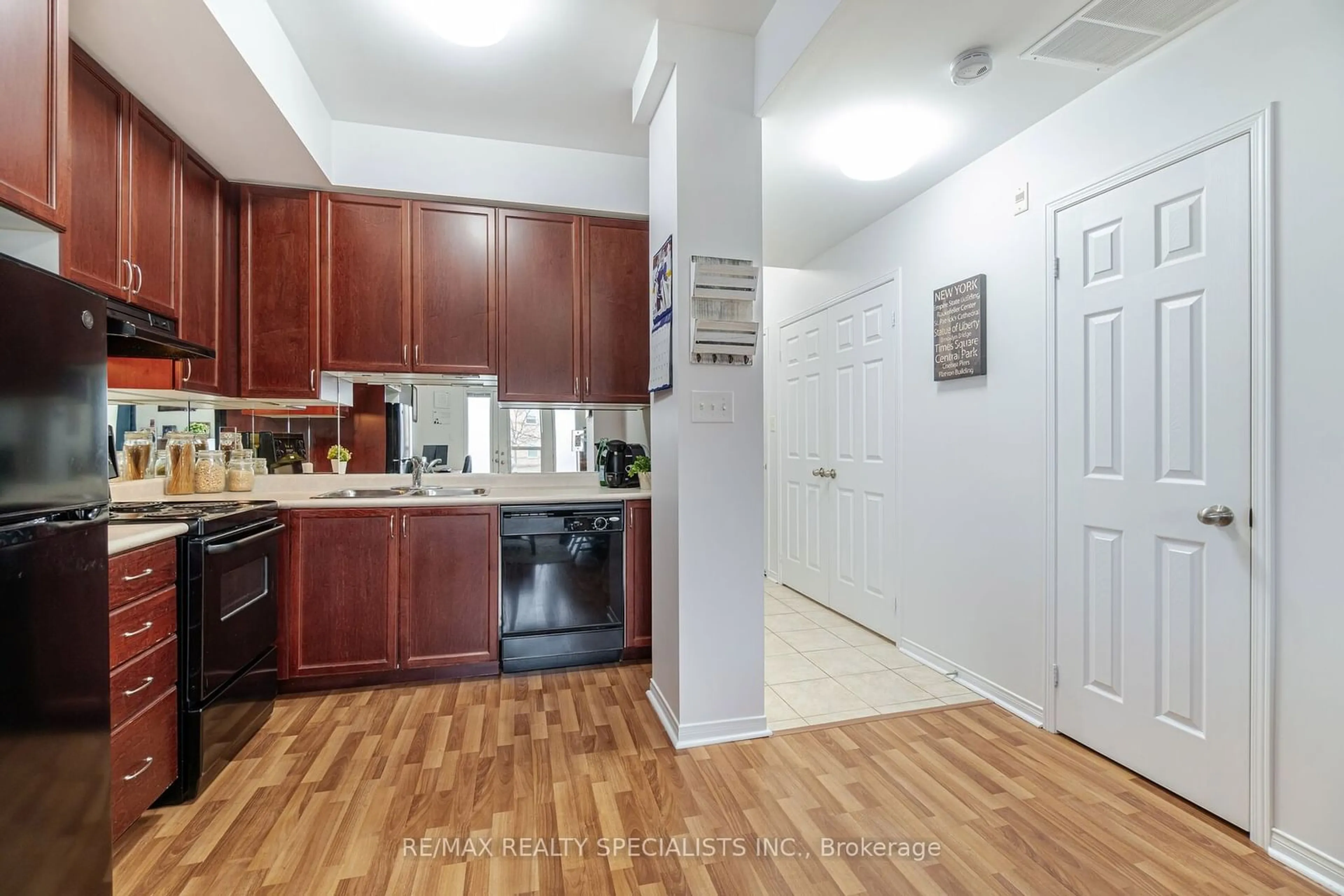 Standard kitchen, wood floors, the street view for 5150 Winston Churchill Blvd #106, Mississauga Ontario L5M 0P1