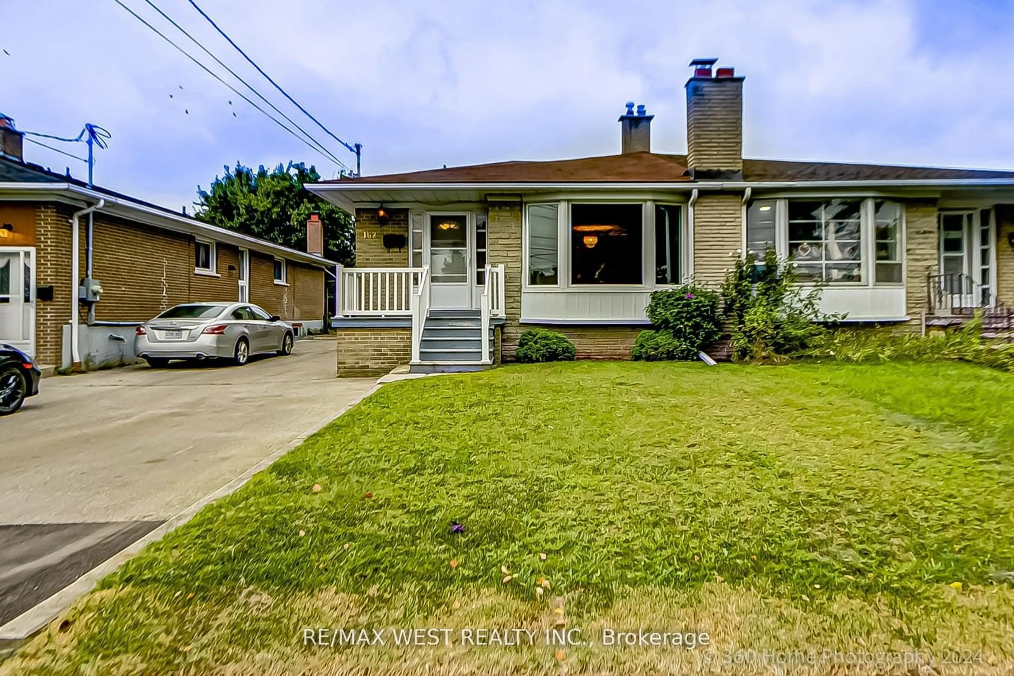 Frontside or backside of a home for 162 Lindylou Rd, Toronto Ontario M9M 2B7