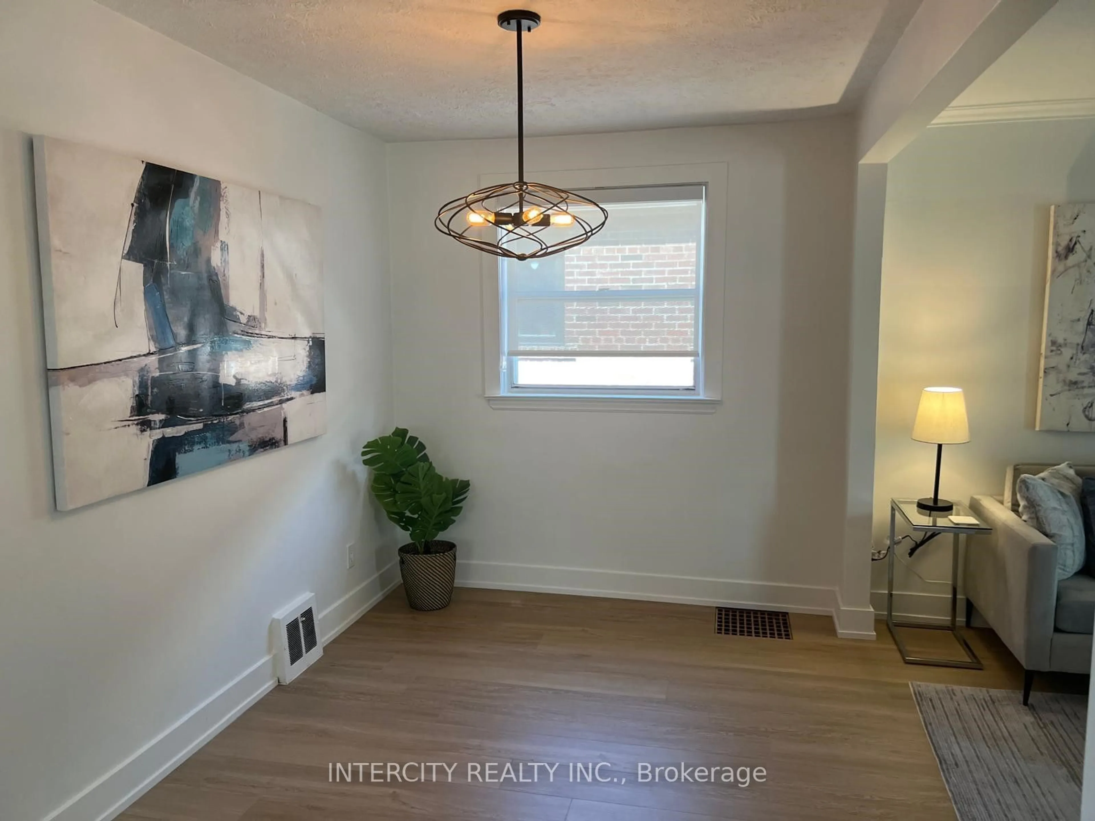 A pic of a room, wood floors for 32 Rothsay Ave, Toronto Ontario M8Z 4M3