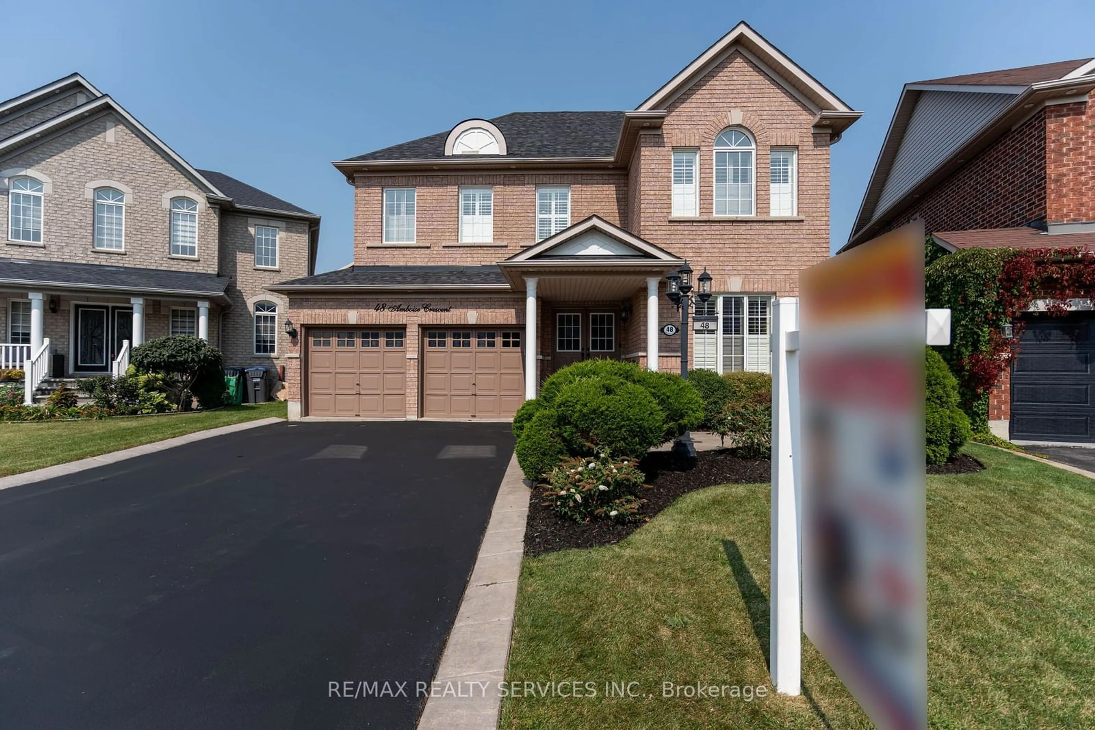 Frontside or backside of a home, the street view for 48 Amboise Cres, Brampton Ontario L7A 3H2