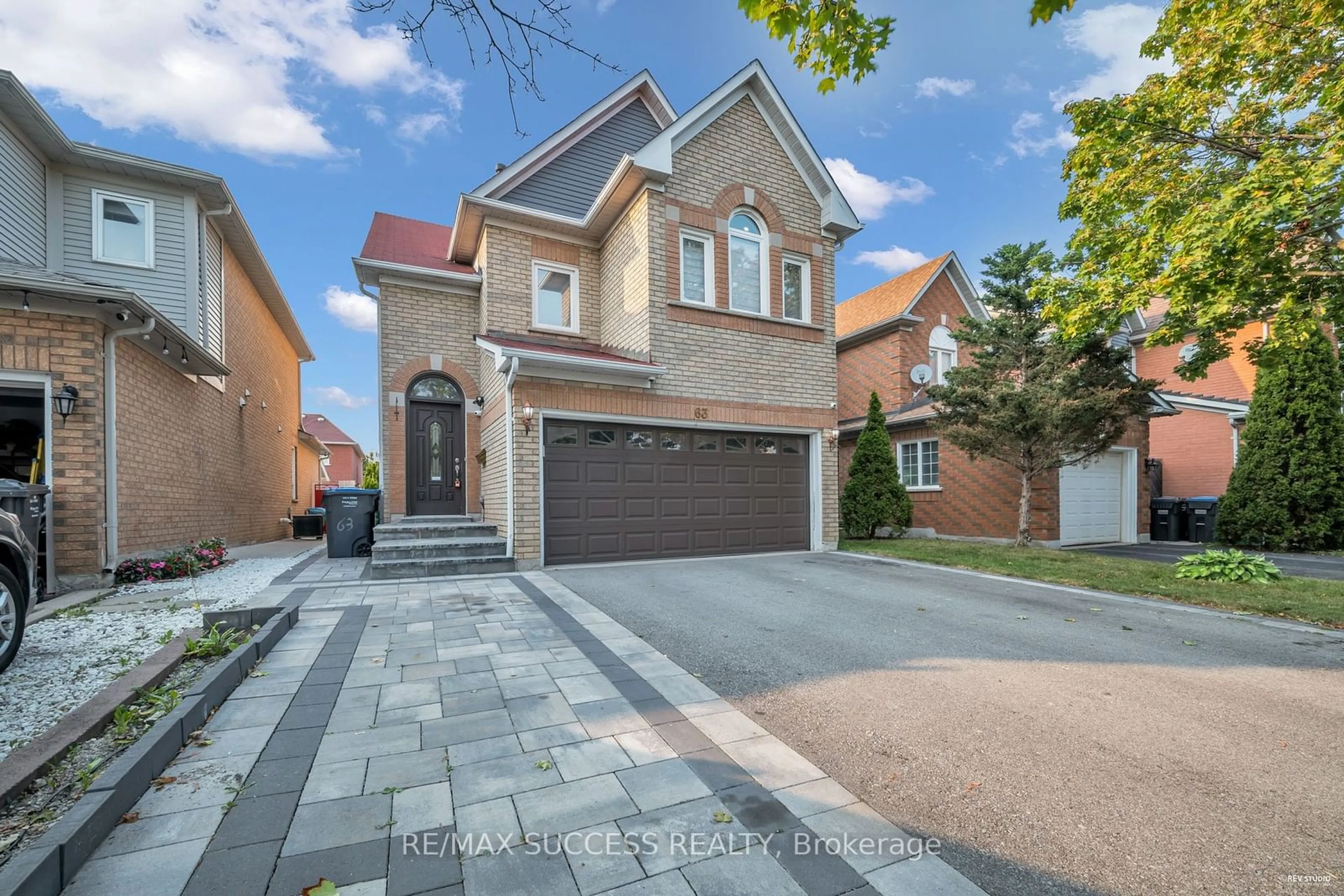 Home with brick exterior material for 63 Blue Spruce St, Brampton Ontario L6R 1C4