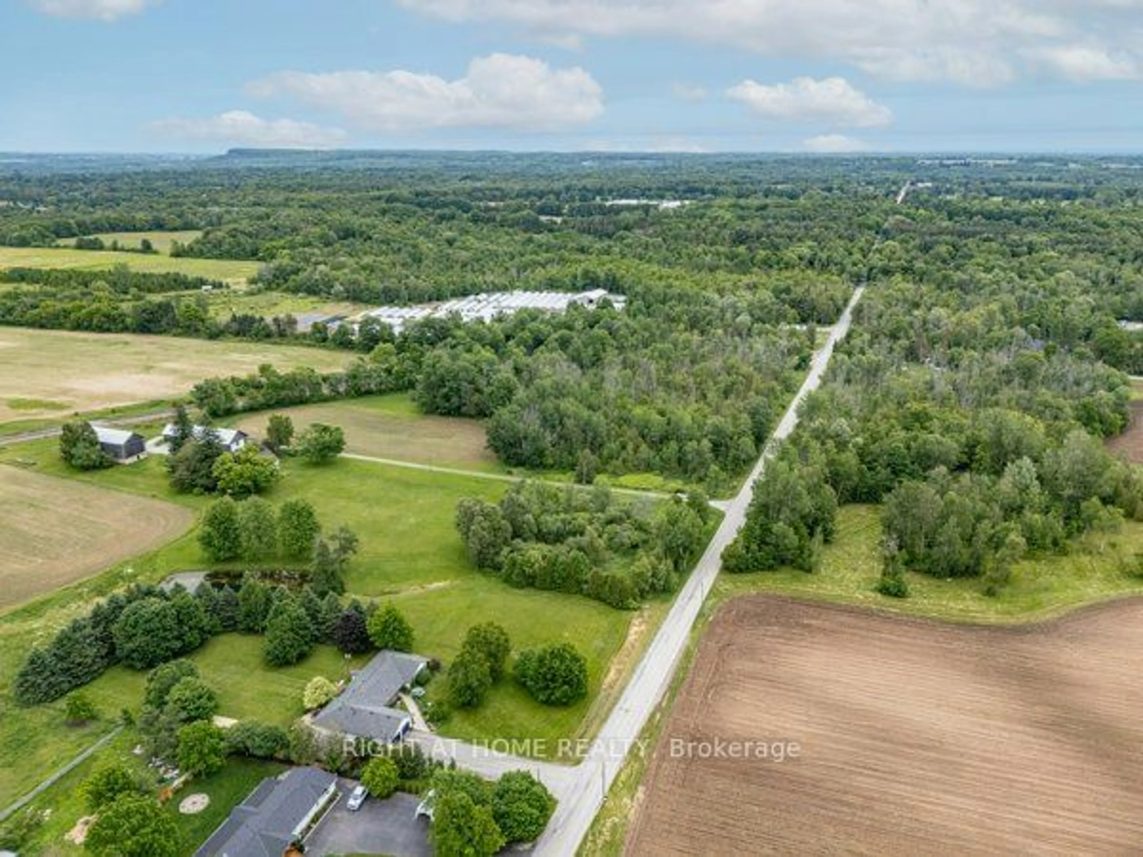 A pic from outside/outdoor area/front of a property/back of a property/a pic from drone, water/lake/river/ocean view for 7385 Milburough Line, Milton Ontario L0P 1B0