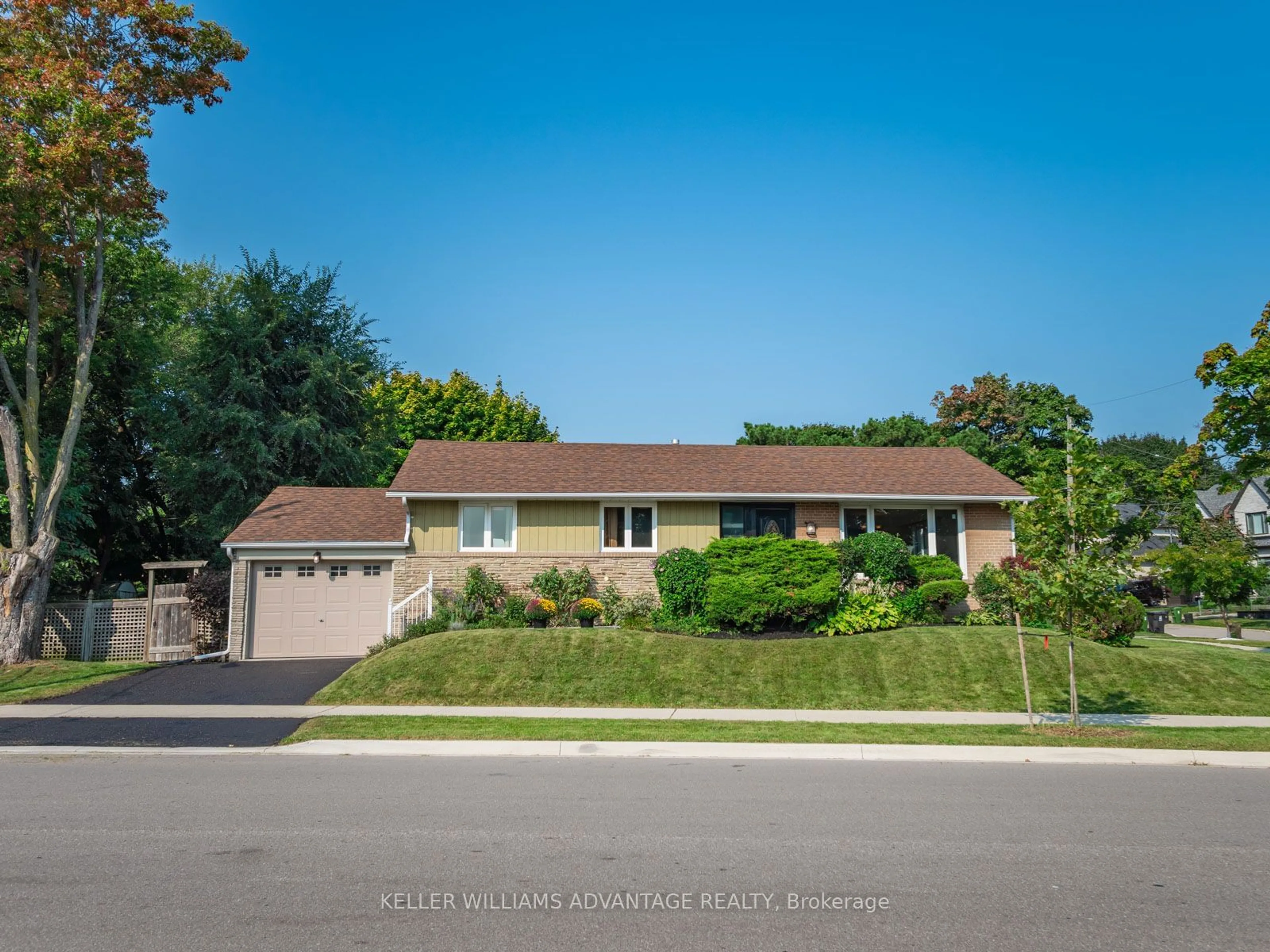 Frontside or backside of a home, the street view for 88 Wellesworth Dr, Toronto Ontario M9C 4R6