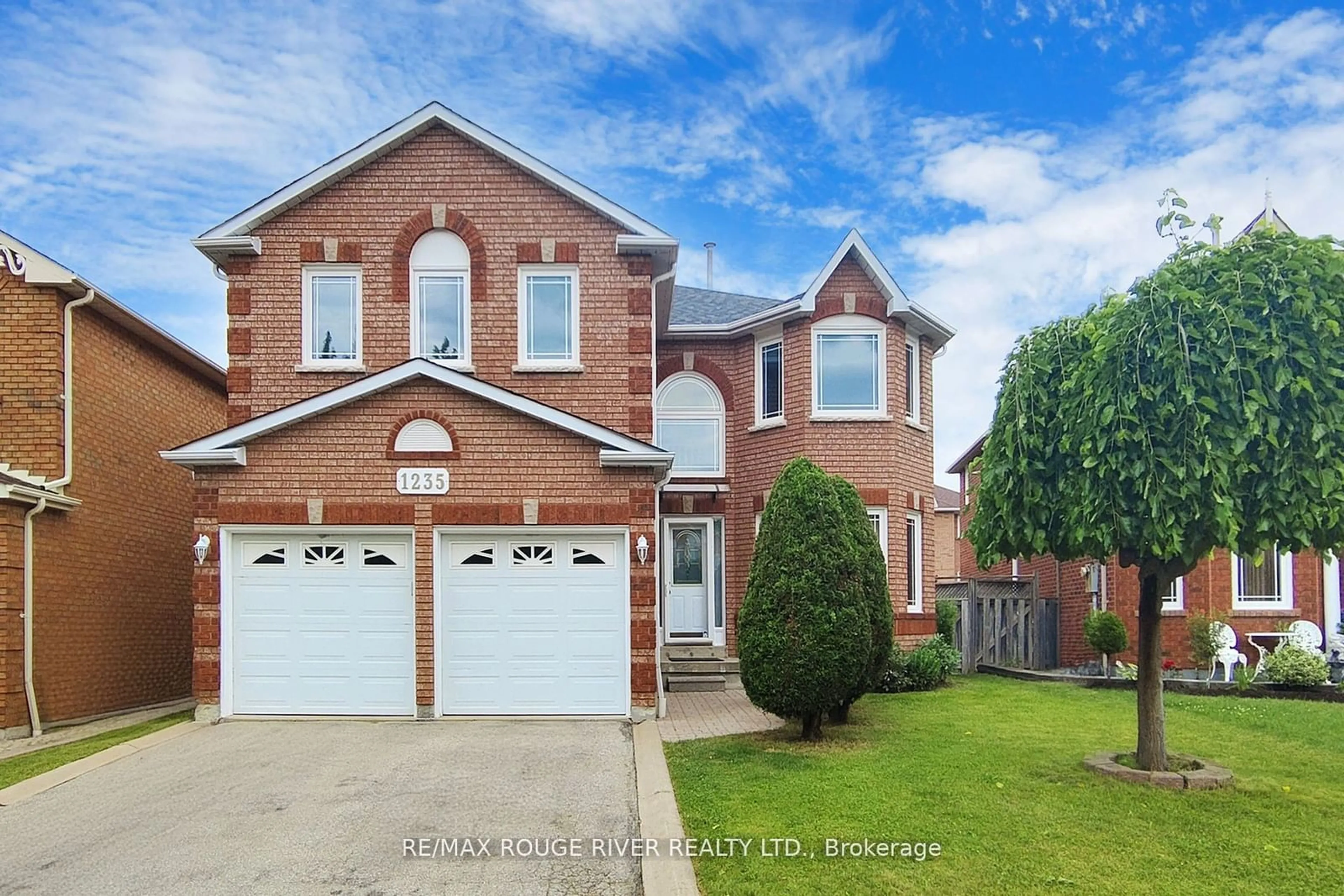 Frontside or backside of a home, the street view for 1235 Windsor Hill Blvd, Mississauga Ontario L5V 1N8