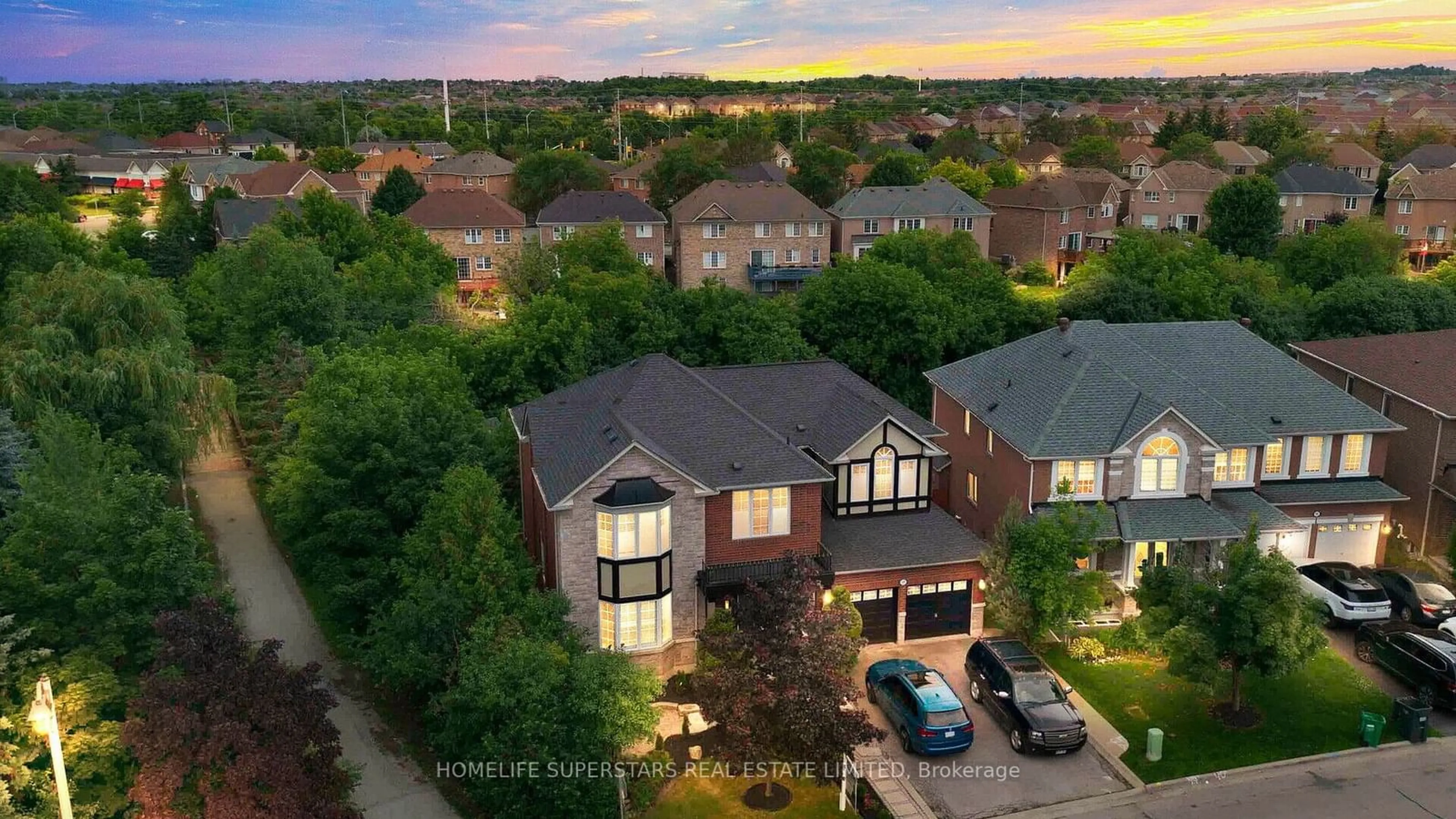 A pic from exterior of the house or condo, the fenced backyard for 127 Whitwell Dr, Brampton Ontario L6P 1L4