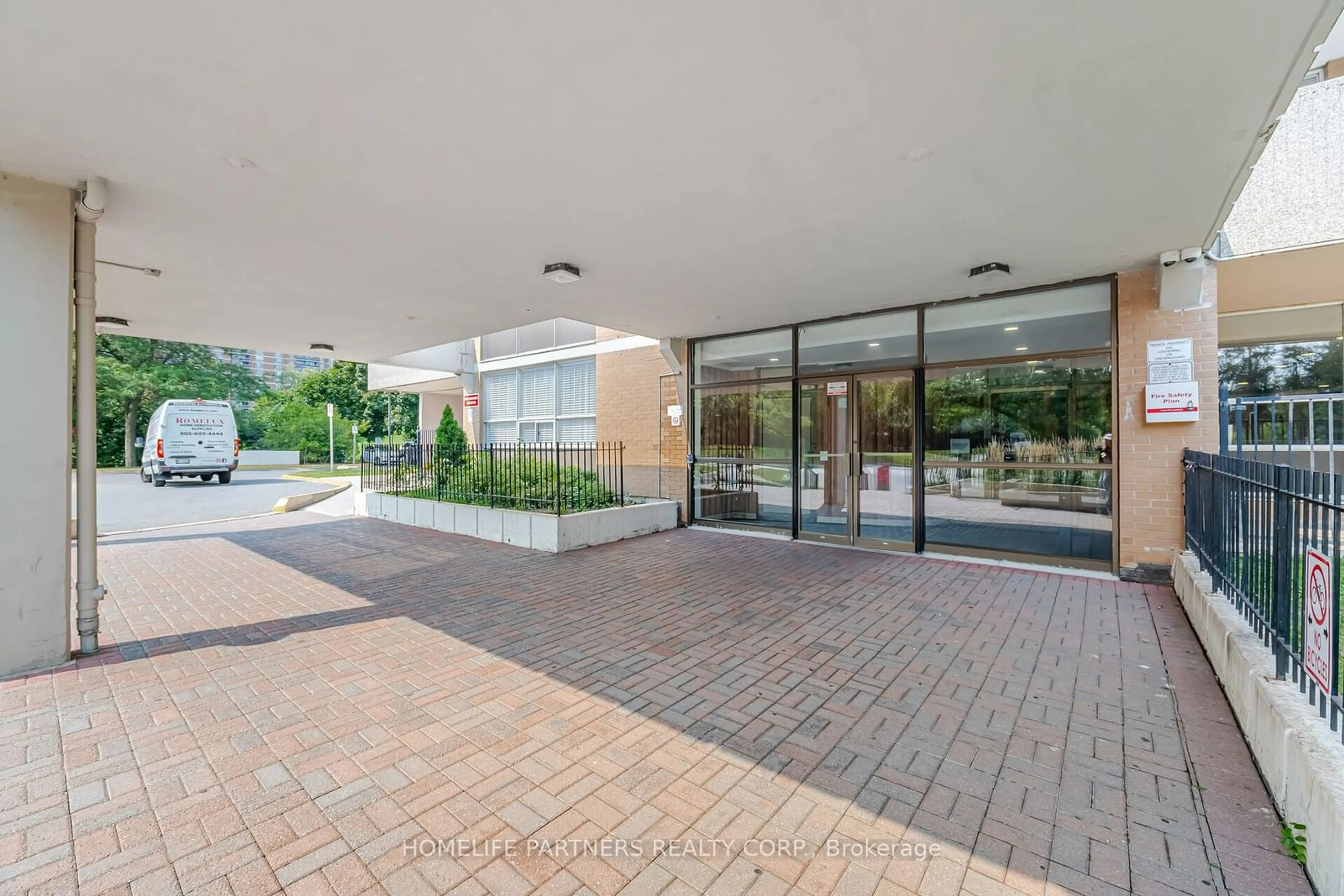 Indoor foyer, cement floor for 40 Panorama Crt #303, Toronto Ontario M9V 4M1