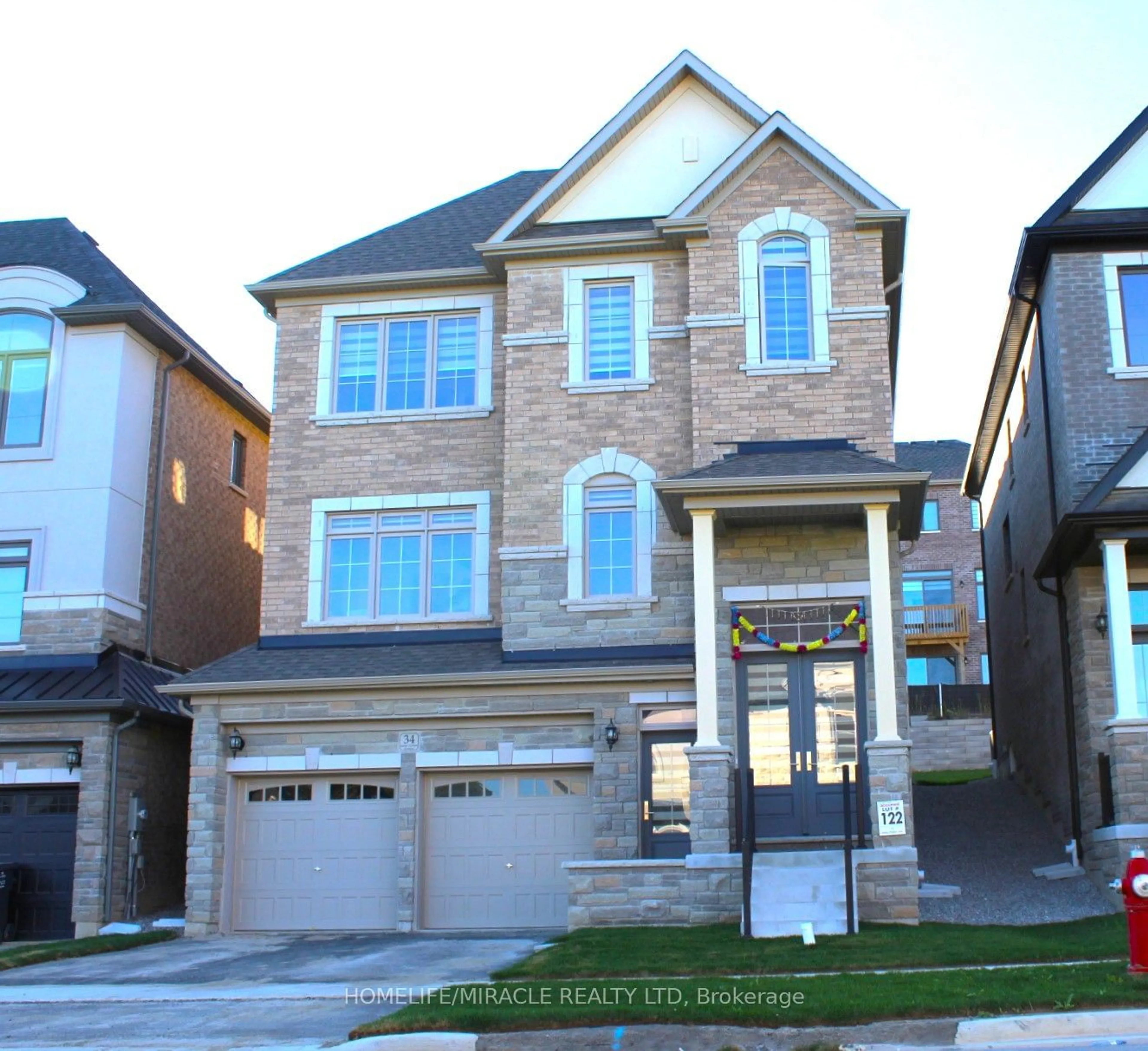 Home with brick exterior material for 34 James Walker Ave, Caledon Ontario L7C 1R5