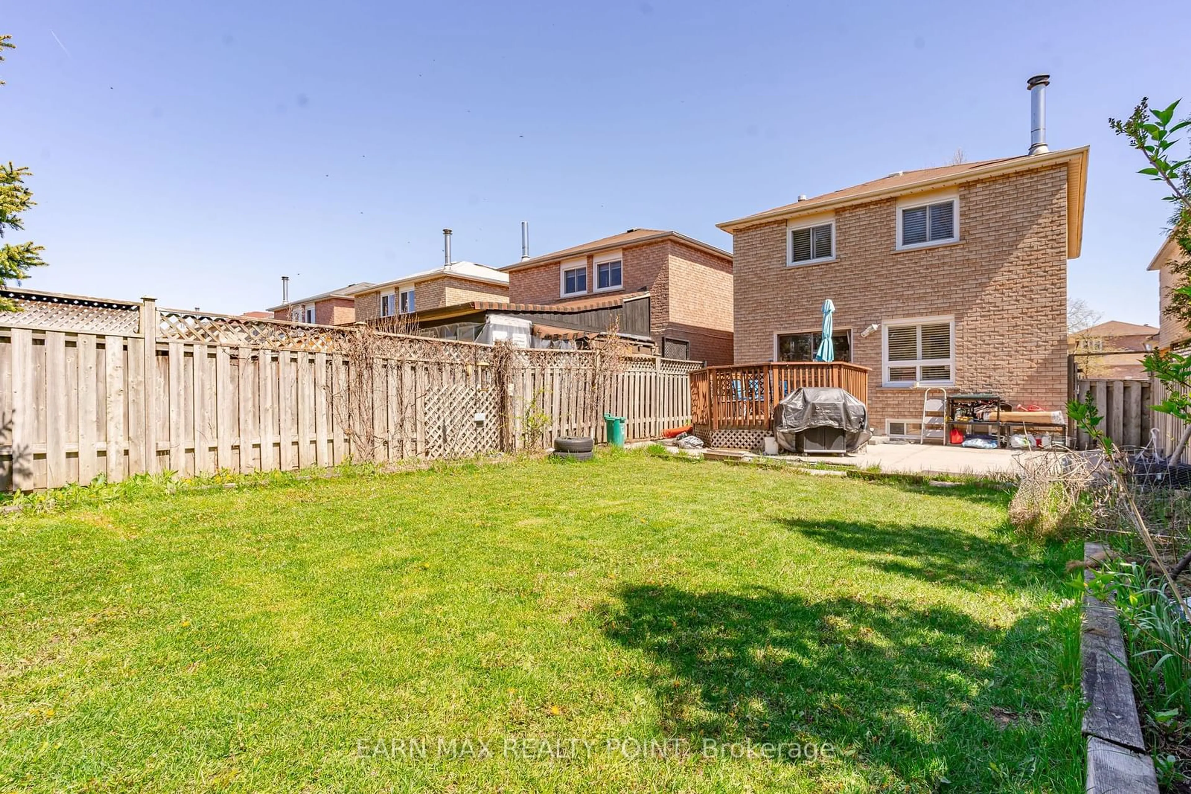 A pic from exterior of the house or condo, the fenced backyard for 200 Ecclestone Dr, Brampton Ontario L6X 3P5