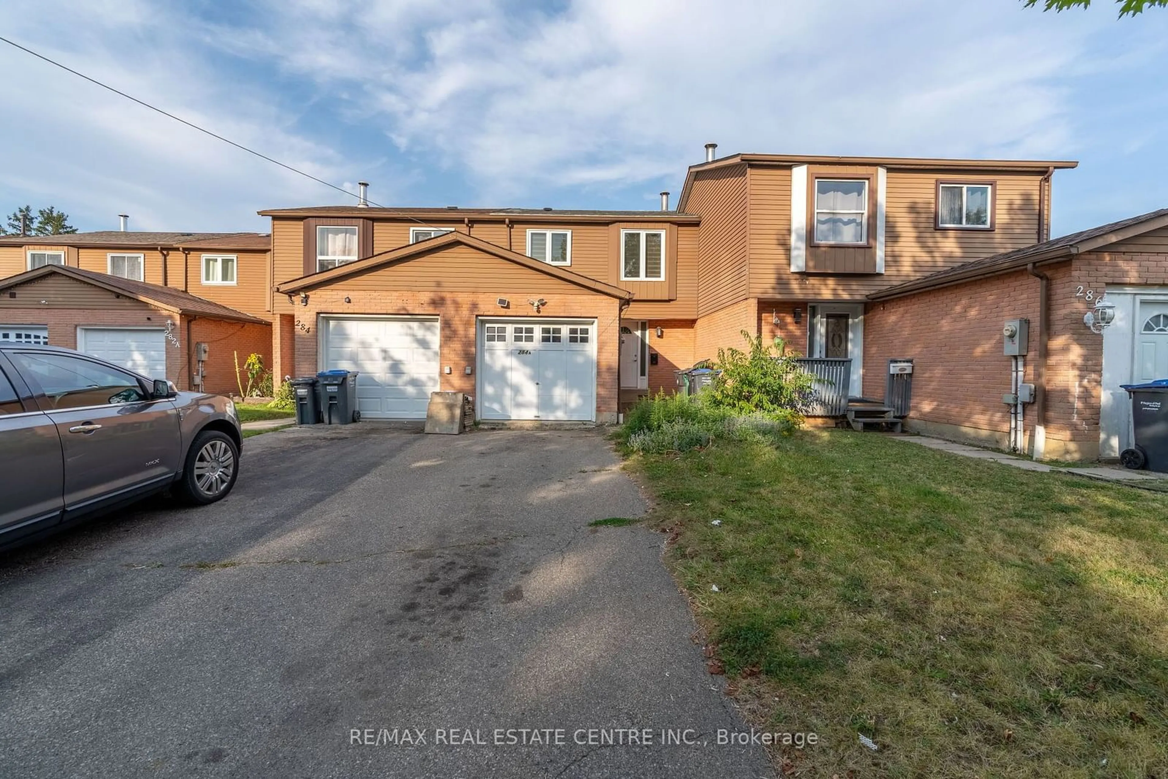 A pic from exterior of the house or condo, the street view for 284-A Royal Salisbury Way, Brampton Ontario L6V 3H4