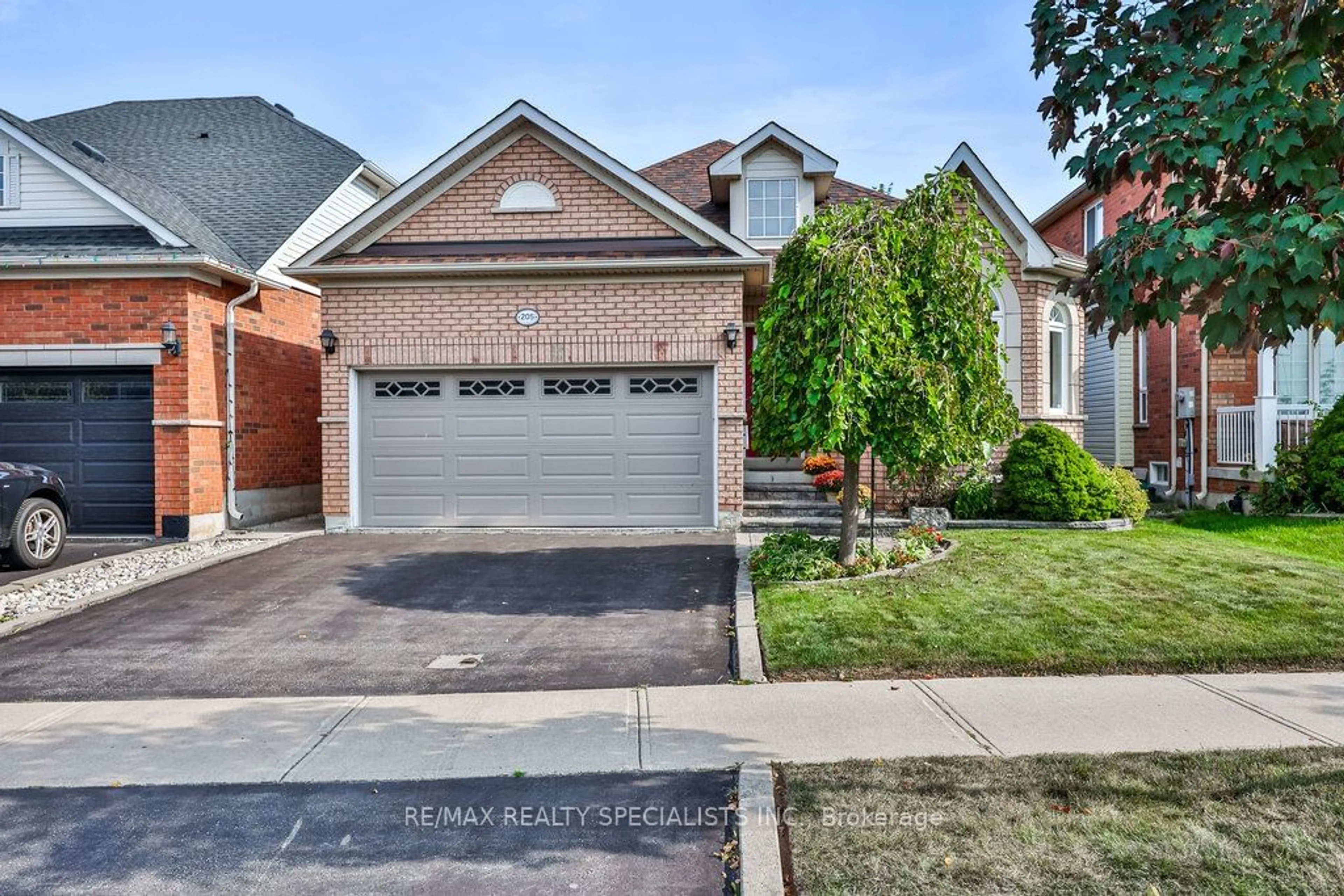 Home with brick exterior material for 205 Ellis Cres, Milton Ontario L9T 6B5