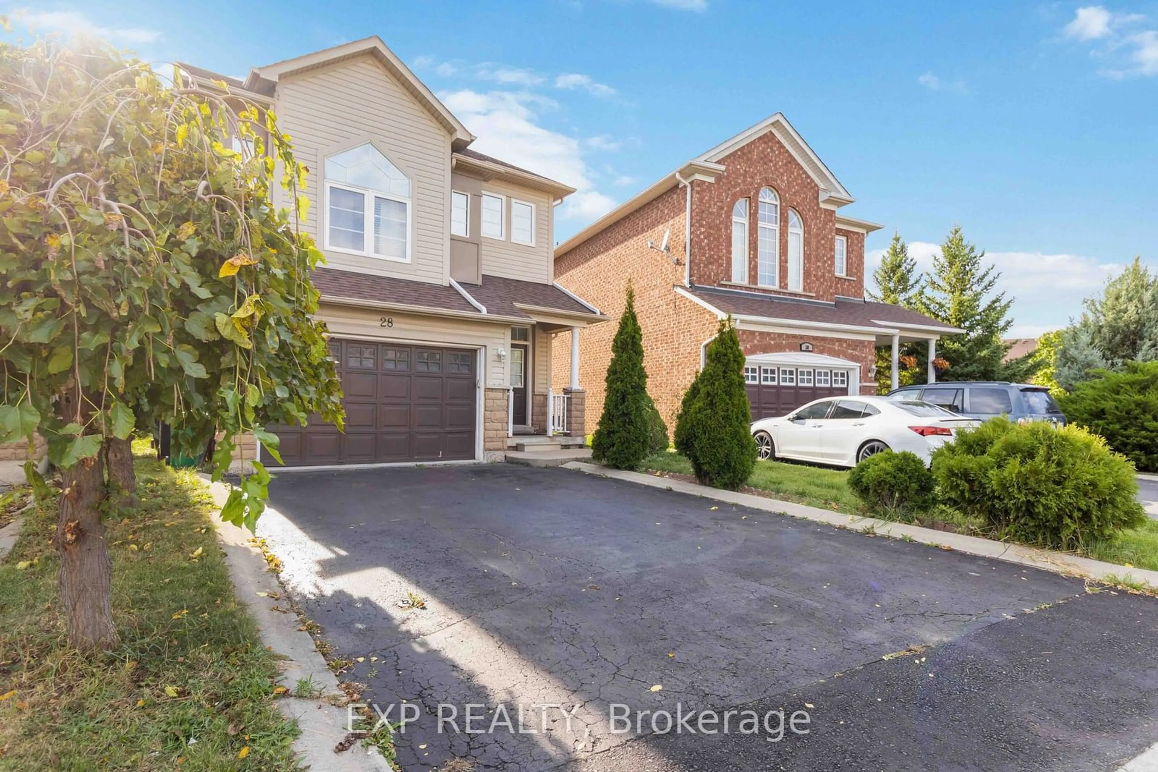 Frontside or backside of a home, the street view for 28 Wandering Trail Dr, Brampton Ontario L7A 1T1