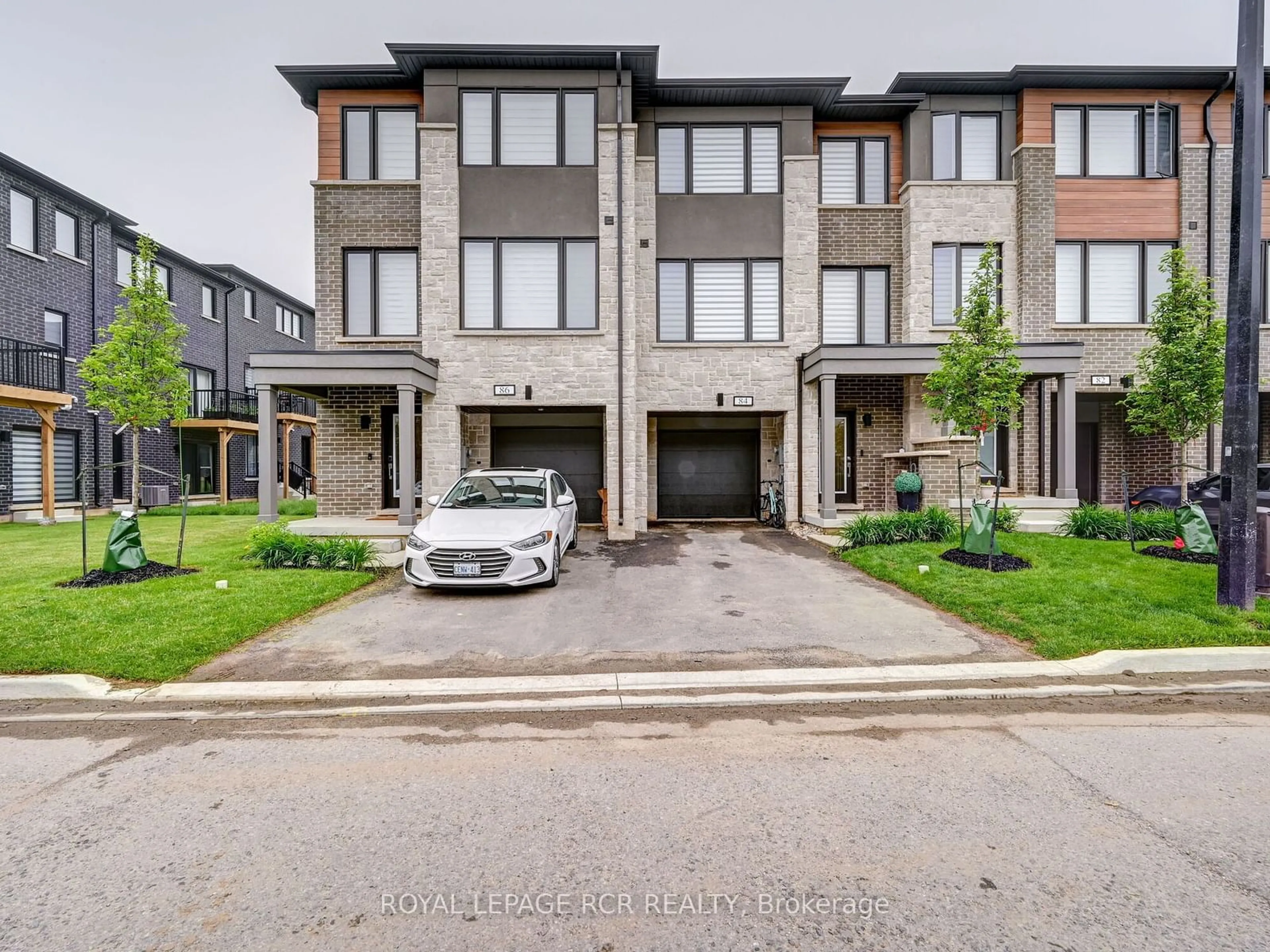 A pic from exterior of the house or condo, the street view for 84 Wind Tree Way, Halton Hills Ontario L7G 0C4