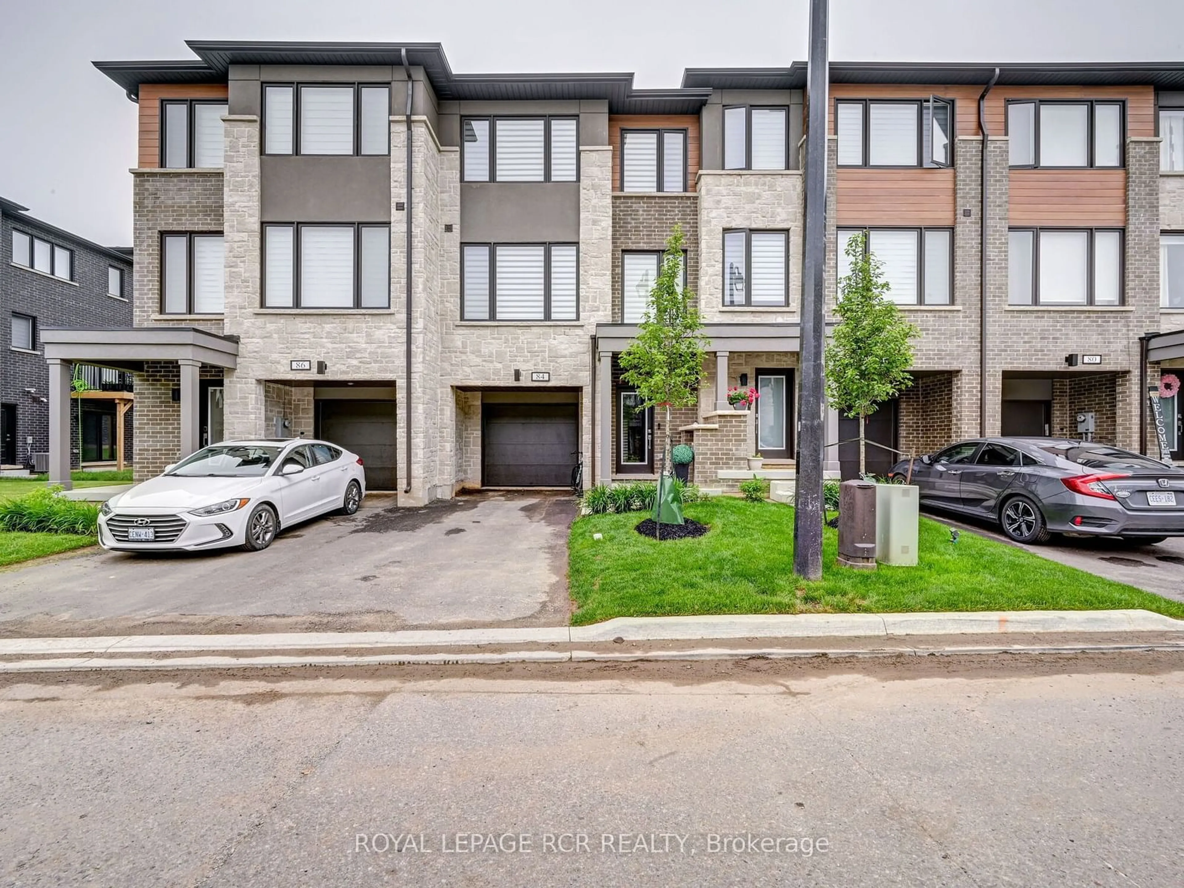 A pic from exterior of the house or condo, the street view for 84 Wind Tree Way, Halton Hills Ontario L7G 0C4