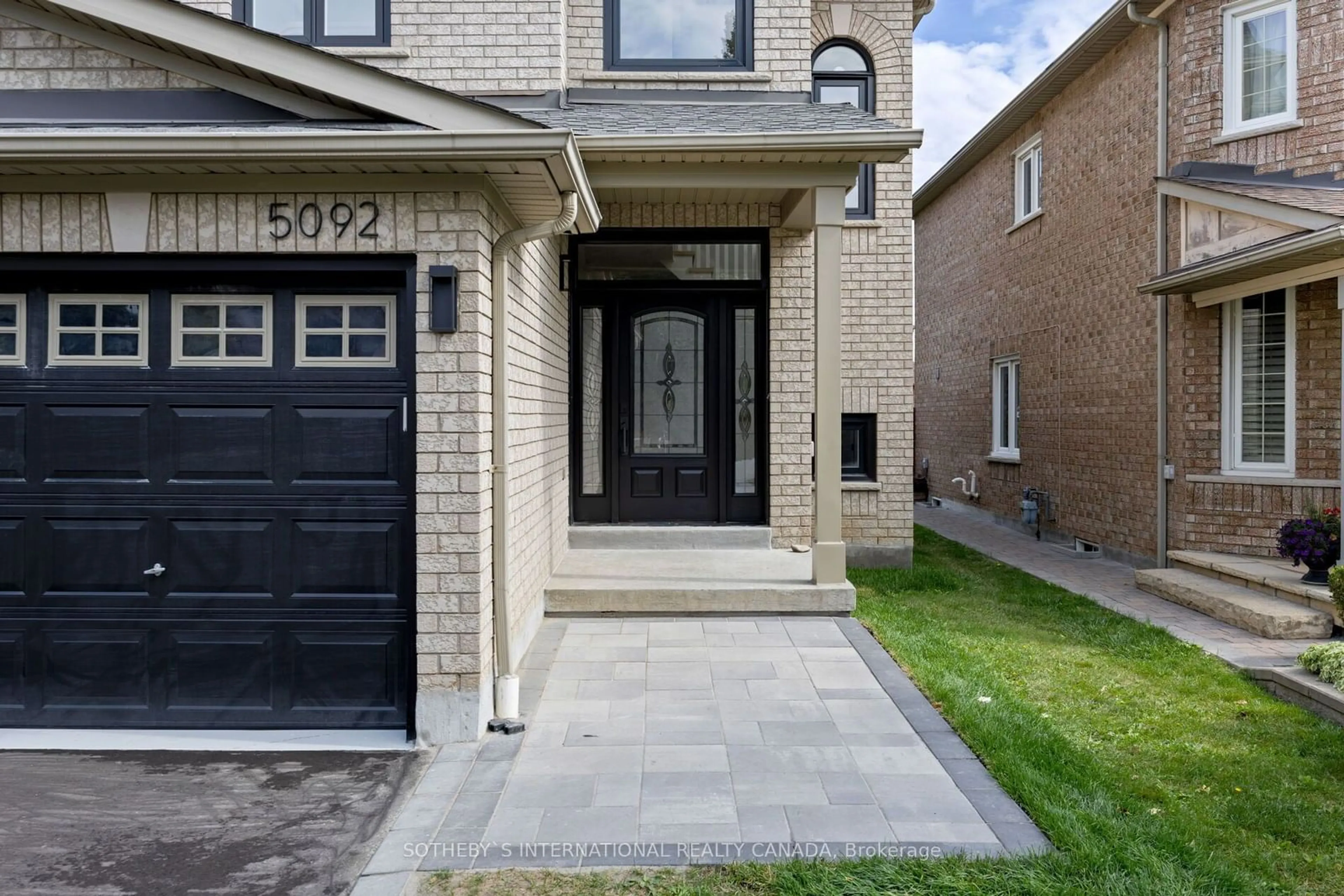 Home with brick exterior material for 5092 Forestwalk Circ, Mississauga Ontario L4Z 4A2