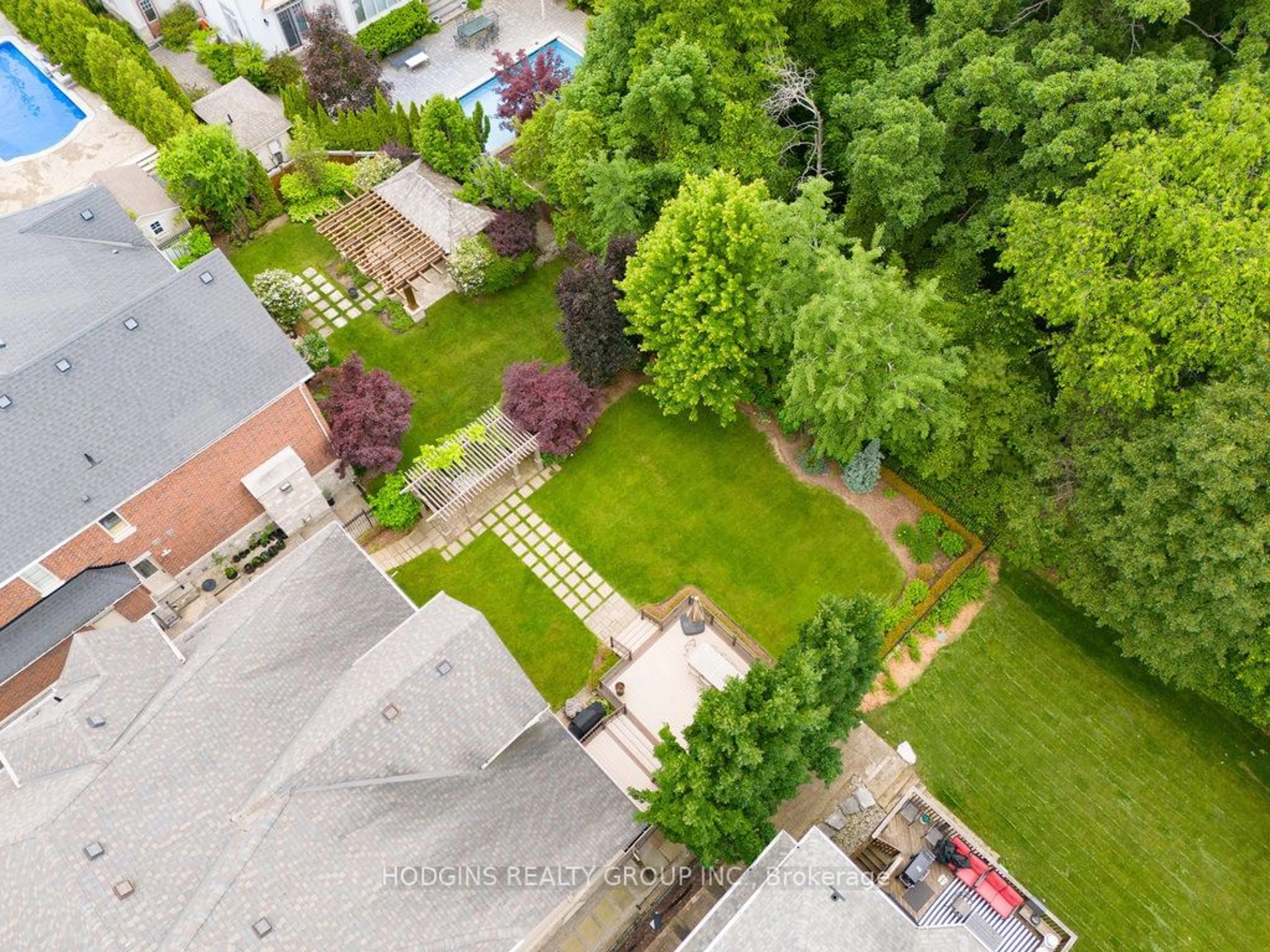 Frontside or backside of a home, the fenced backyard for 1857 Ivygate Crt, Mississauga Ontario L5L 0A8