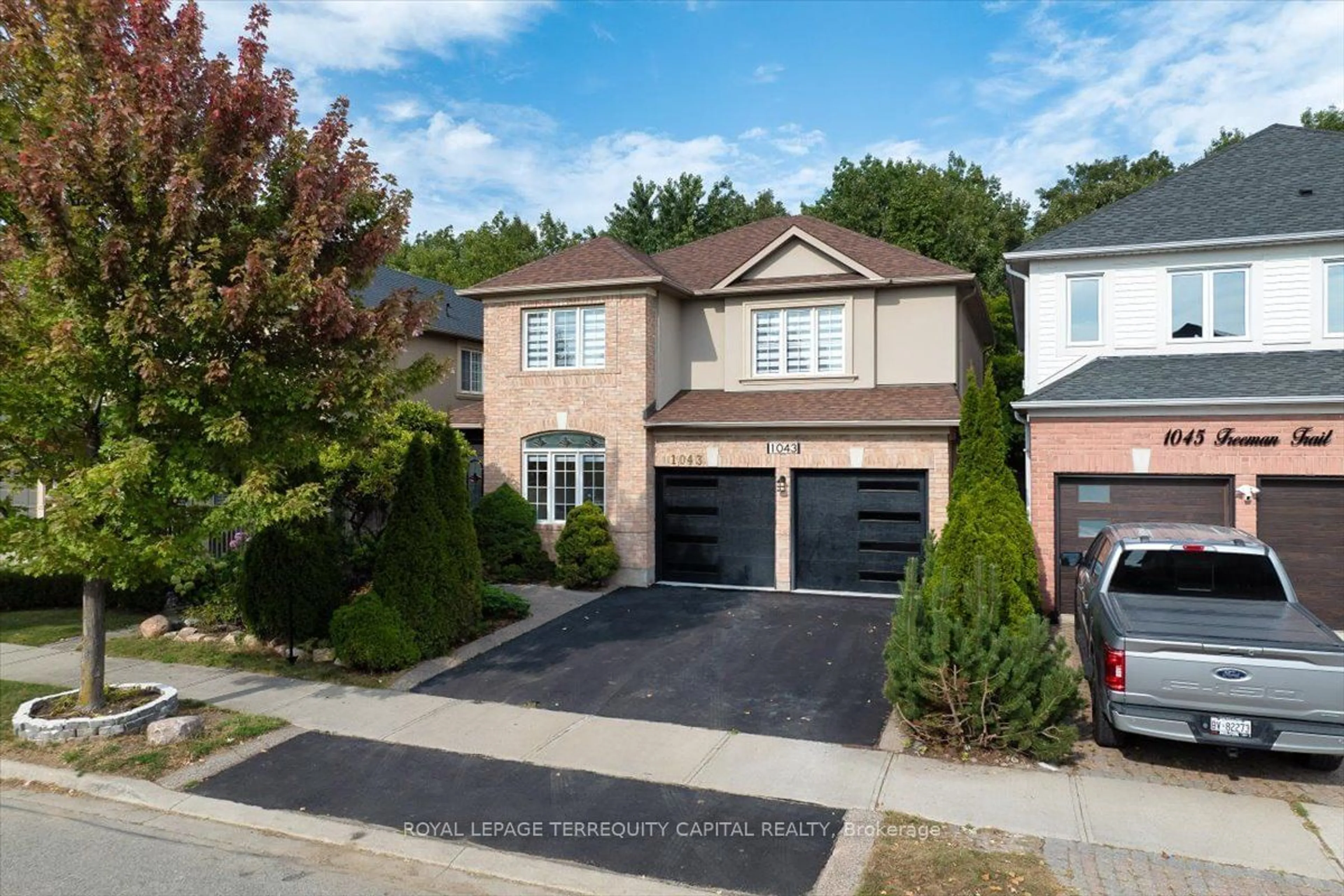 Frontside or backside of a home for 1043 Freeman Tr, Milton Ontario L9T 5T3