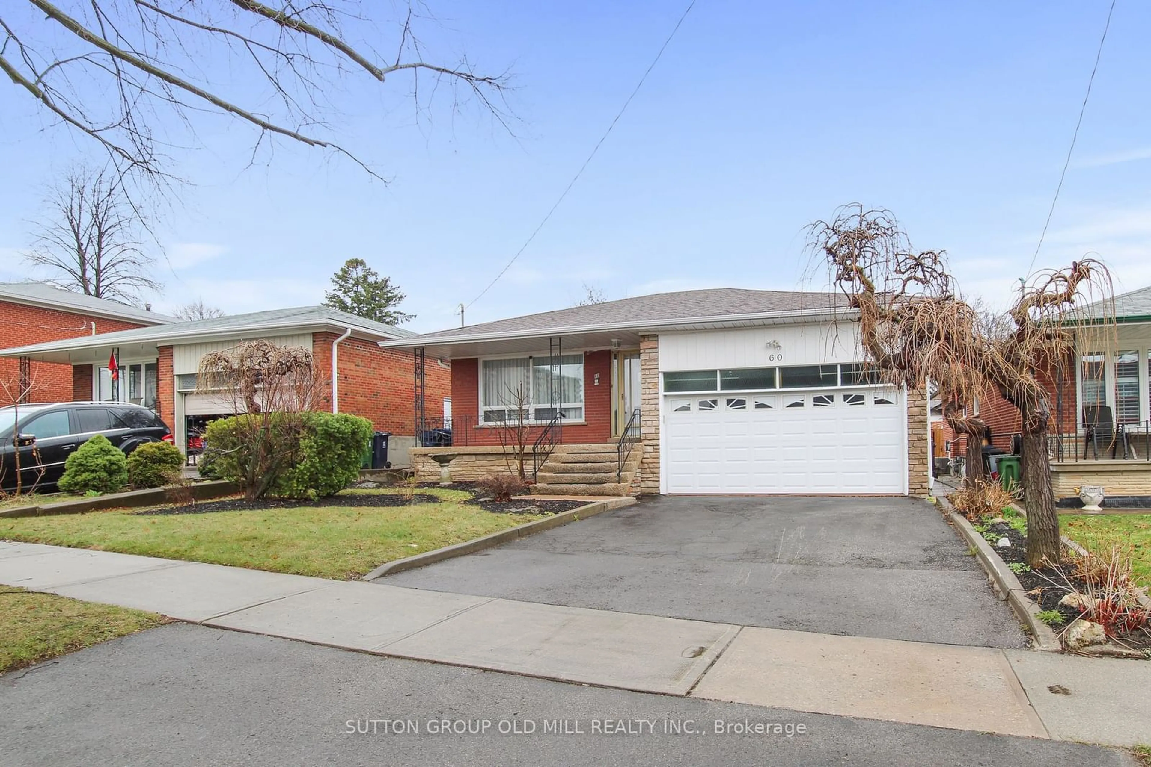 Frontside or backside of a home, the street view for 60 Ridgemount Rd, Toronto Ontario M9P 1C5