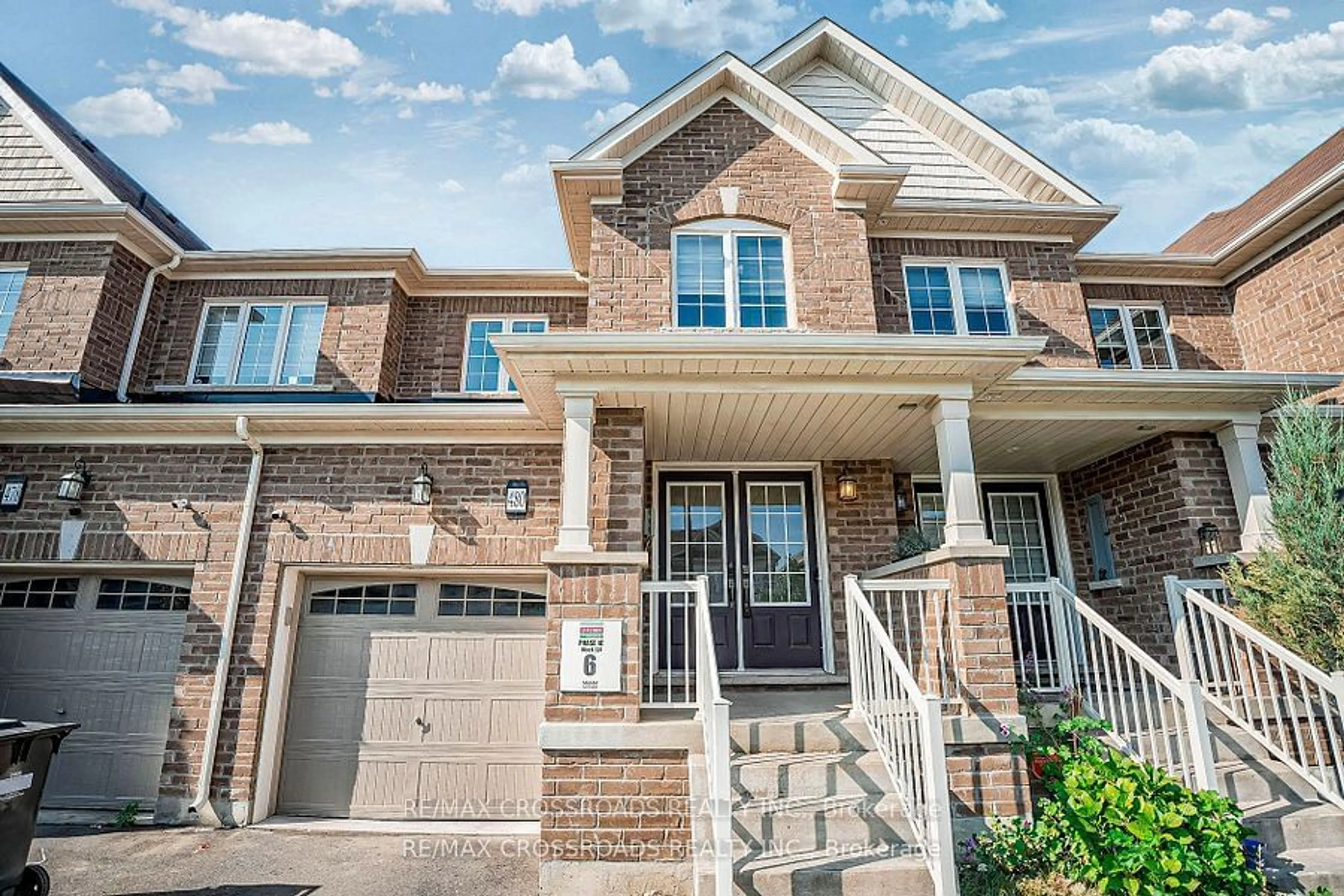 Home with brick exterior material for 480 Queen Mary Dr, Brampton Ontario L7A 0C7