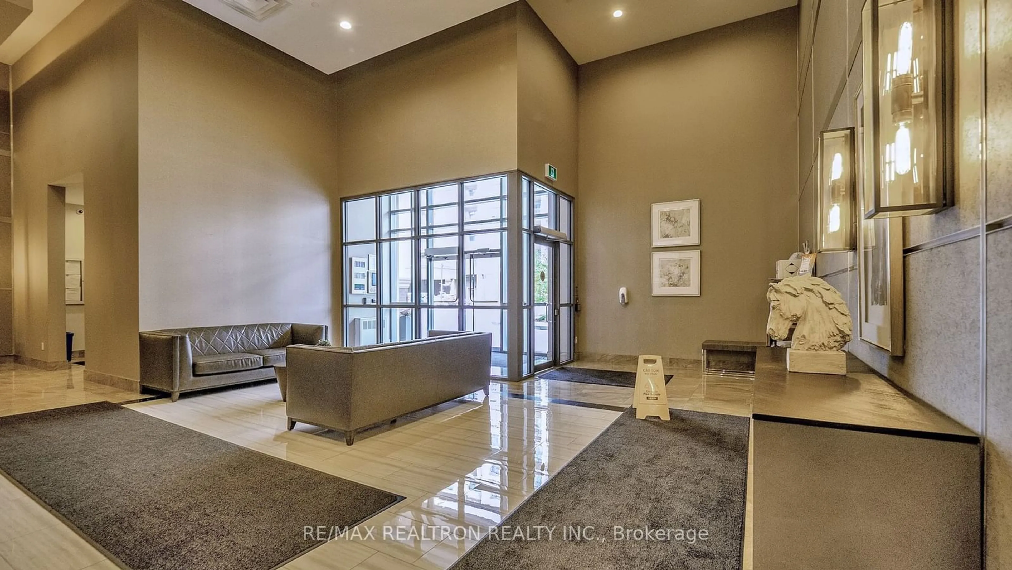 Indoor lobby, cement floor for 2490 Old Bronte Rd #116, Oakville Ontario L6M 0Y5